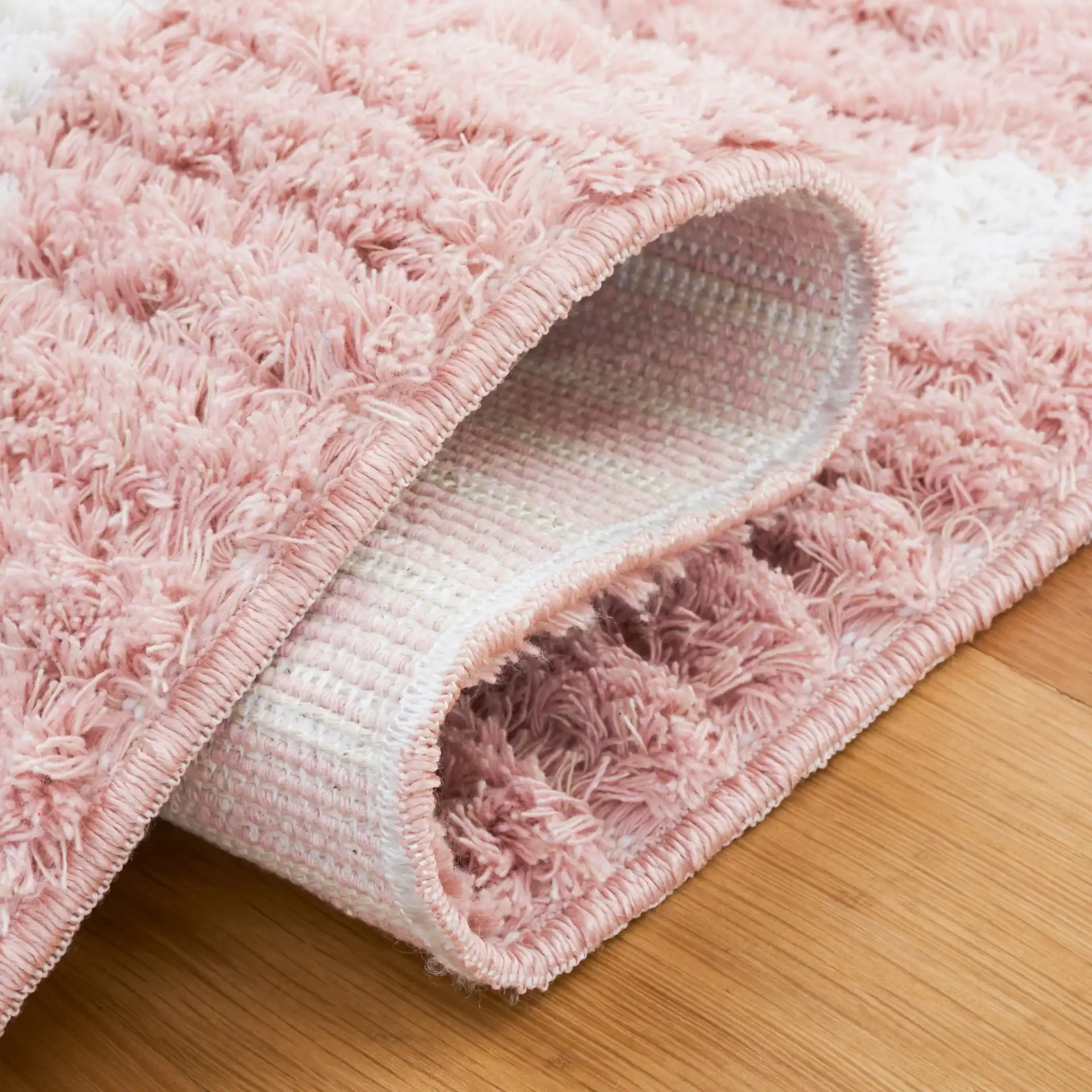 Augustine Diamond Trellis Rug in Pink / Ivory in a styled room
