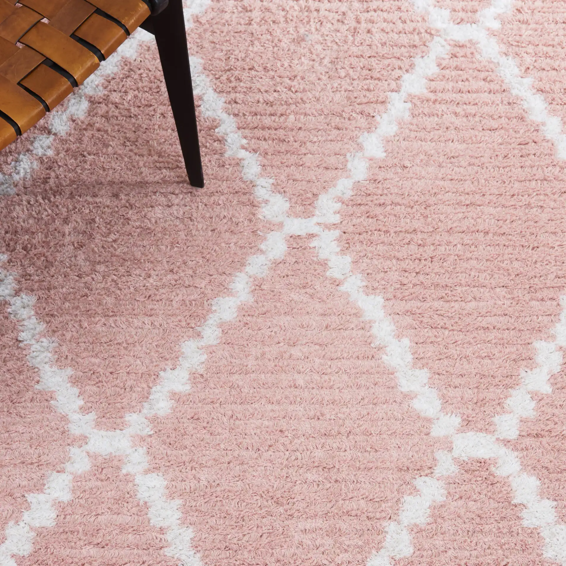 Augustine Diamond Trellis Rug in Pink / Ivory in a styled room