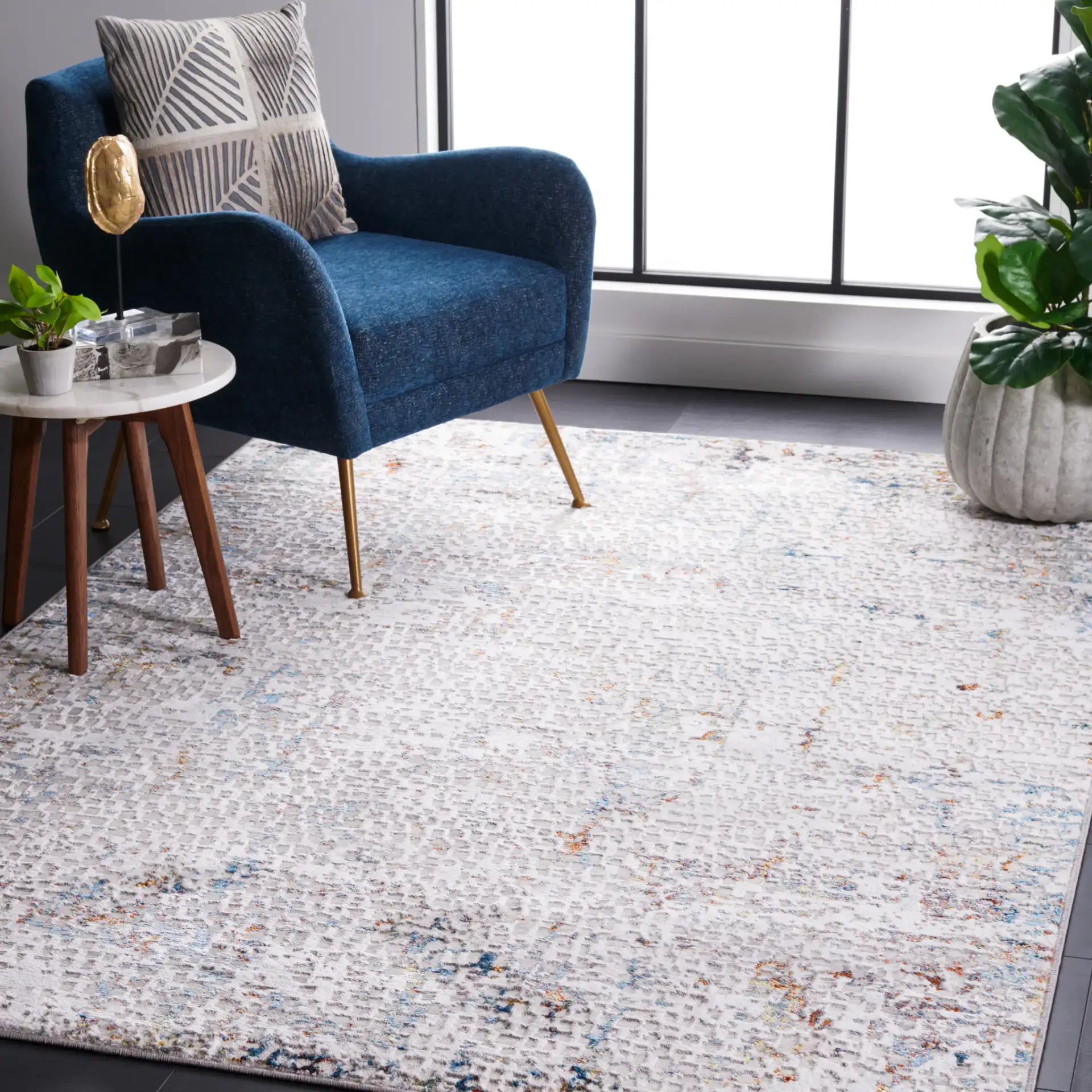 Amelia Textured Abstract Rug in Gray / Light Gray in a styled room