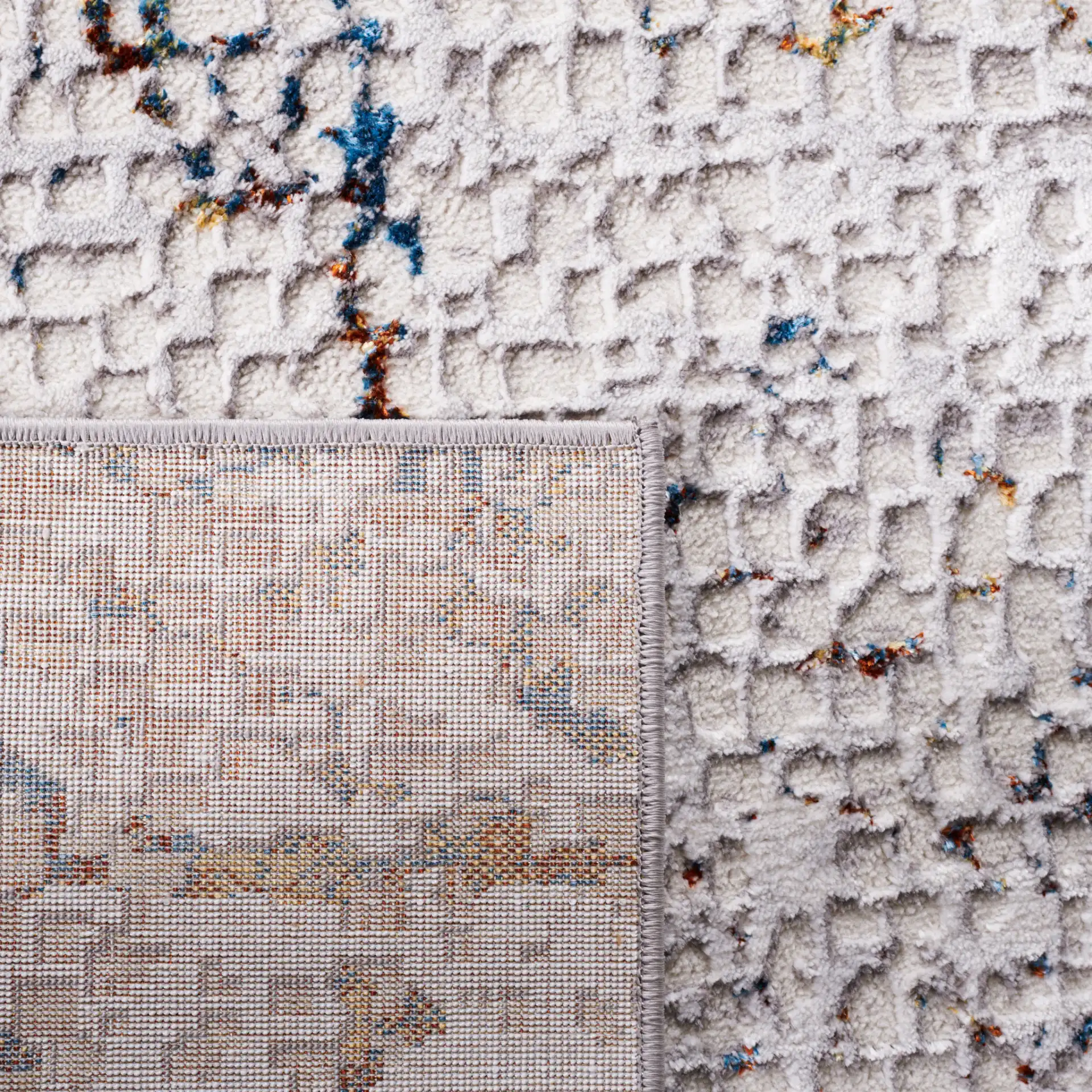 Amelia Textured Abstract Rug in Gray / Light Gray in a styled room