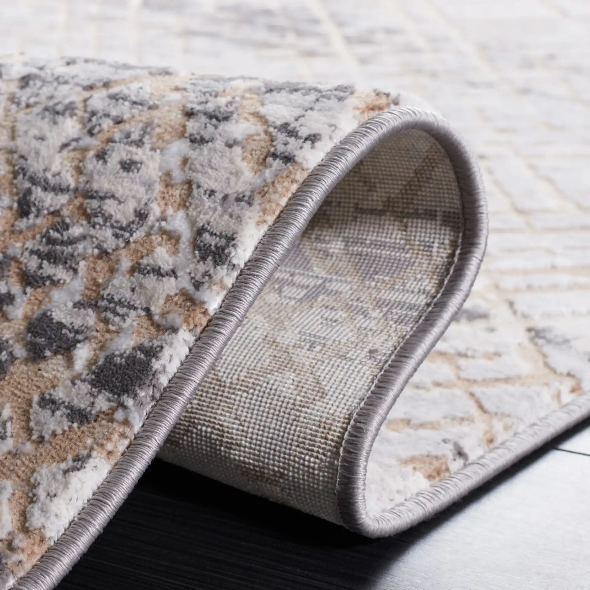 Amelia Distressed Trellis Rug in Gray / Beige in a styled room