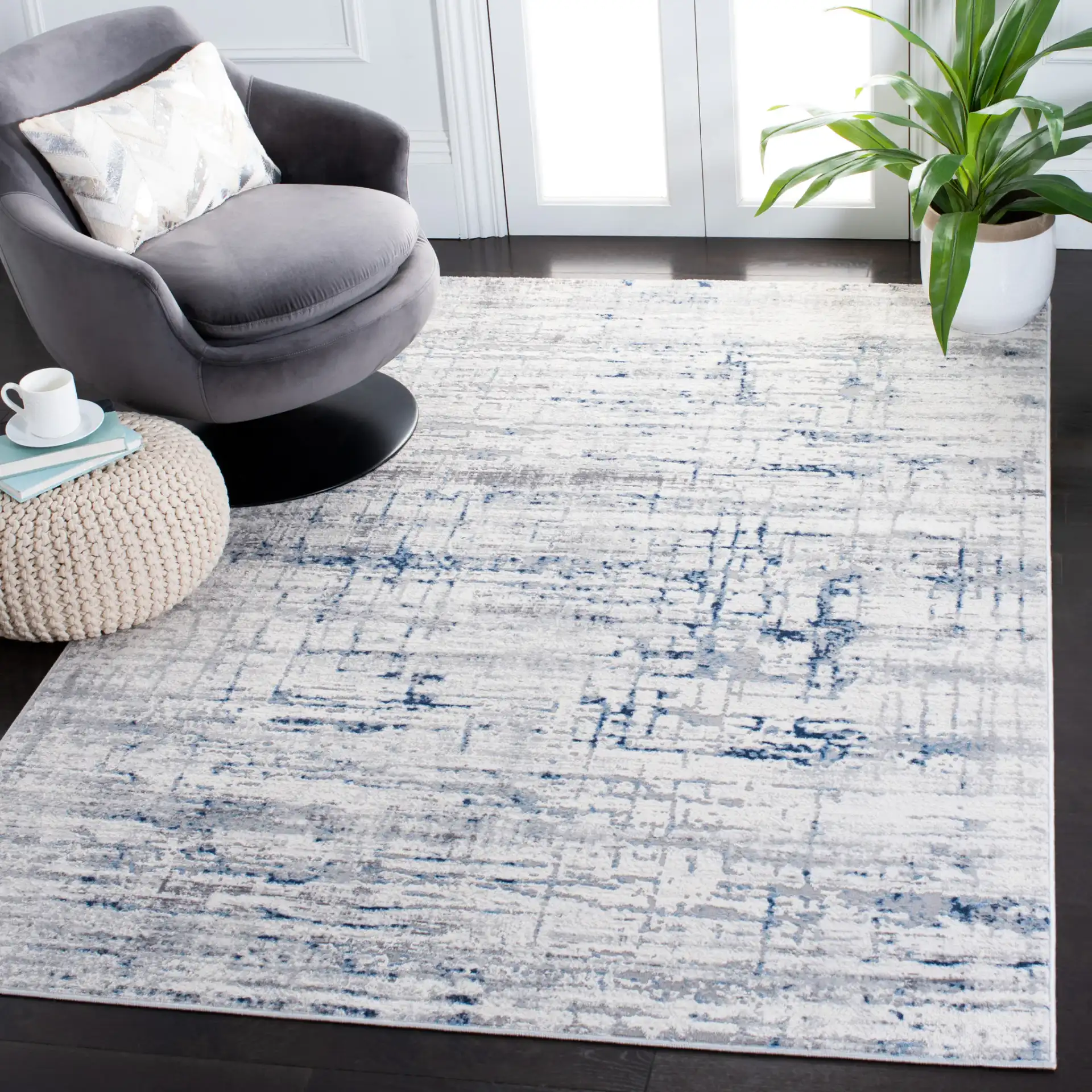 Amelia Abstract Linear Rug in Ivory / Blue in a styled room