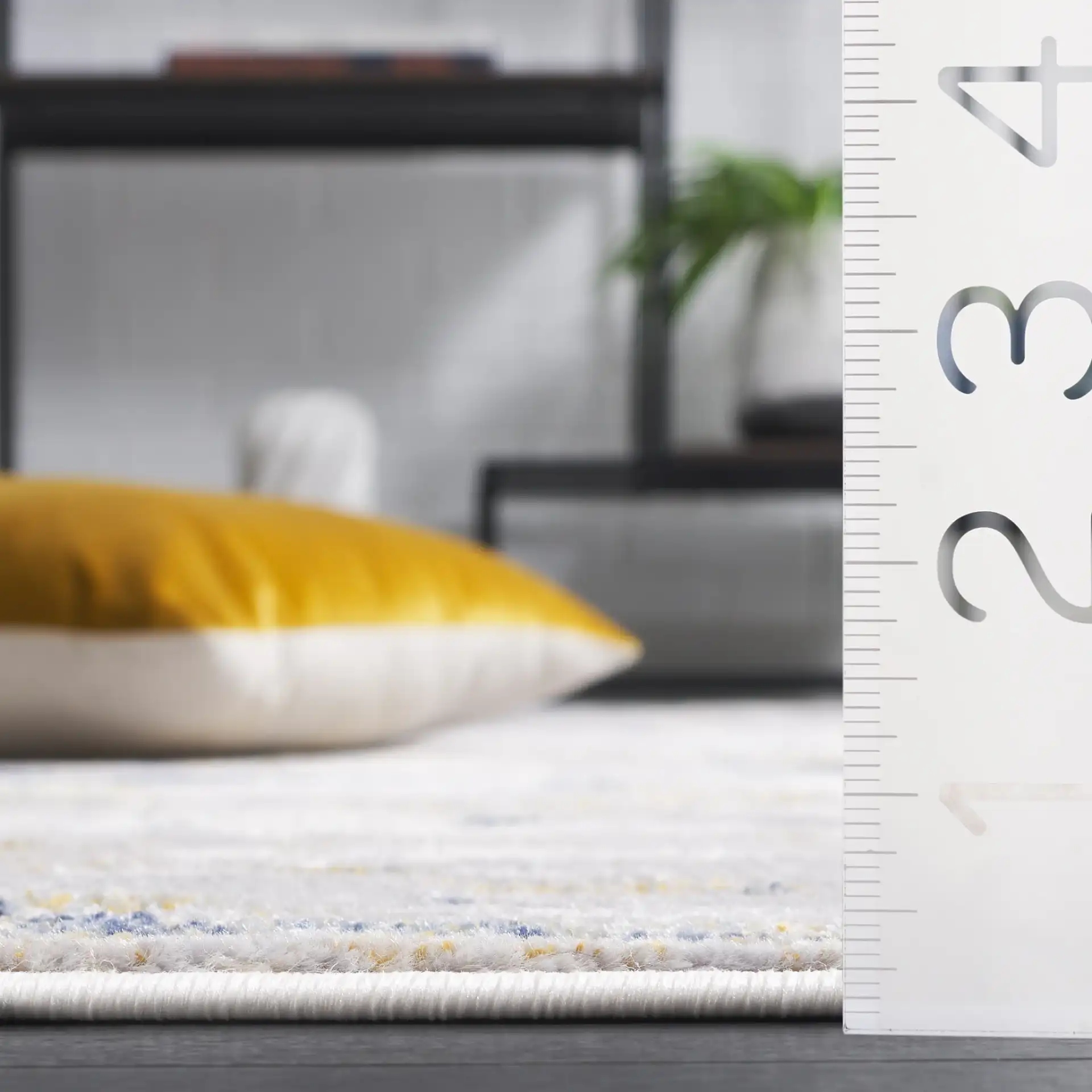 Amelia Abstract Painterly Rug in Ivory / Gray in a styled room
