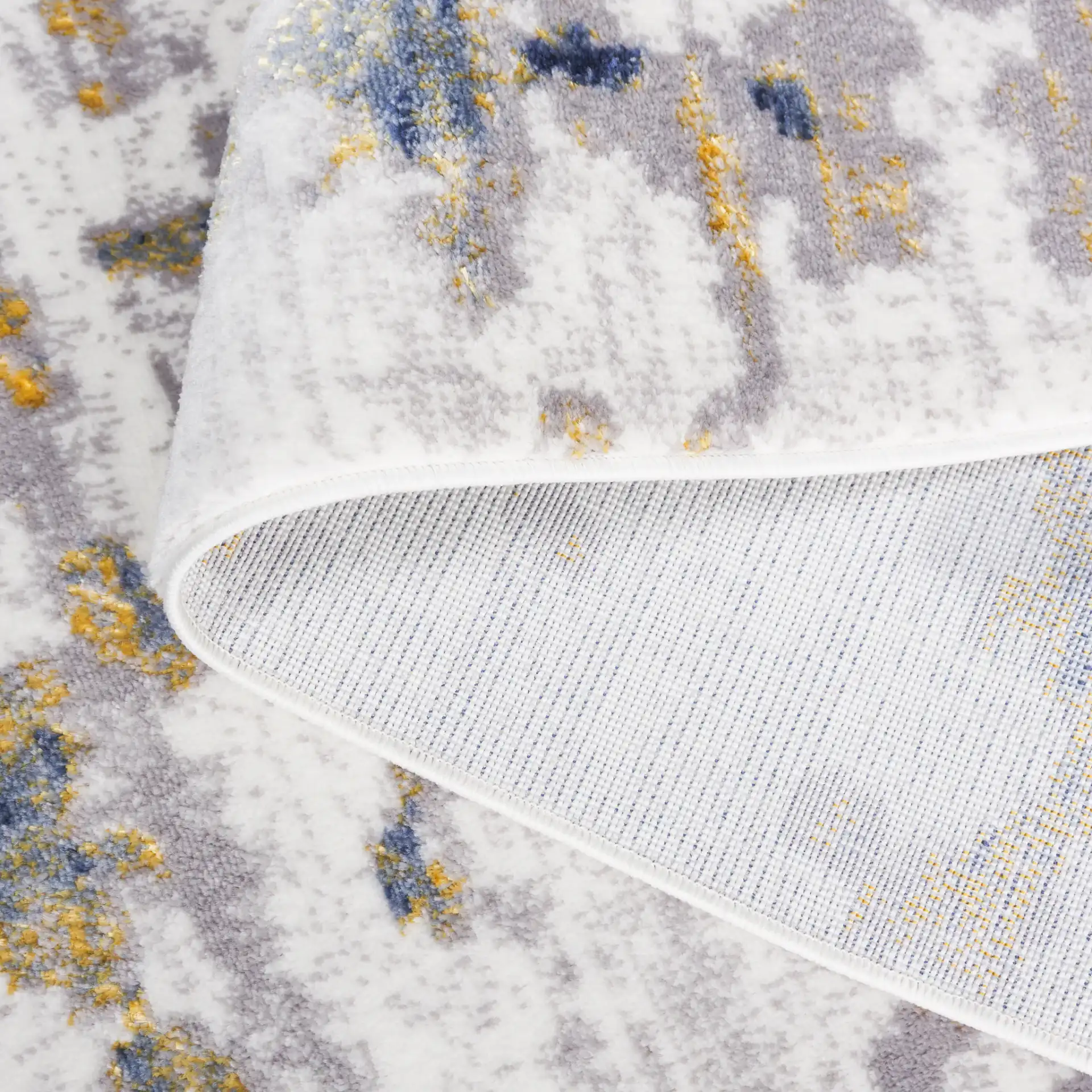 Amelia Abstract Painterly Rug in Ivory / Gray in a styled room