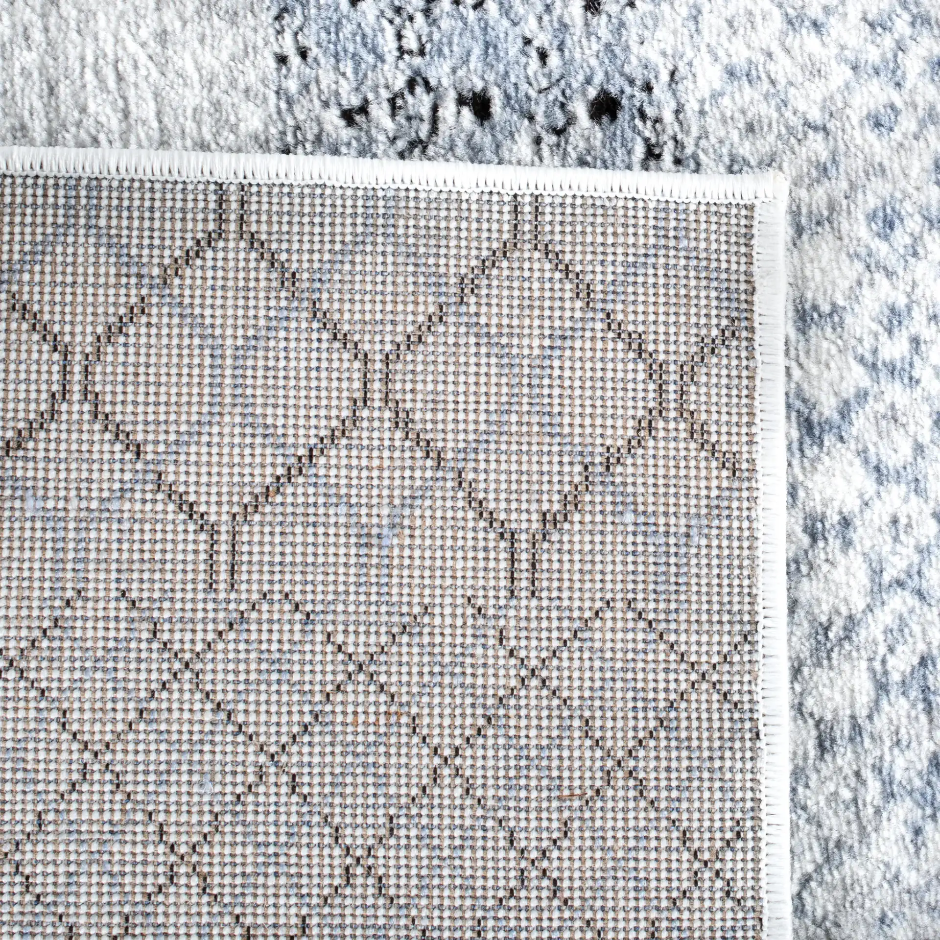 Amelia Distressed Stripe Rug in Gray / Light Blue in a styled room