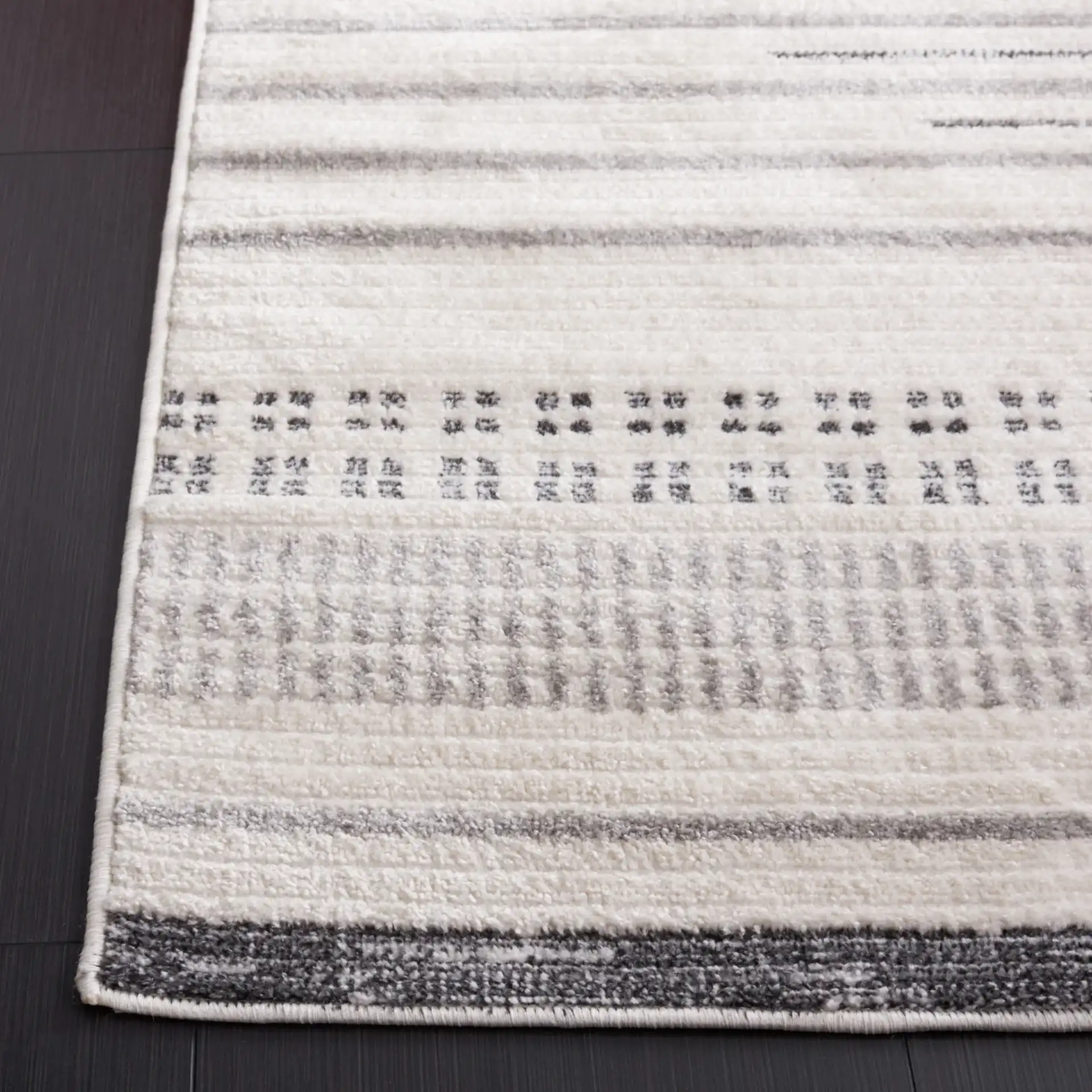 Alamo Linear Sphere Rug in Ivory / Gray in a styled room