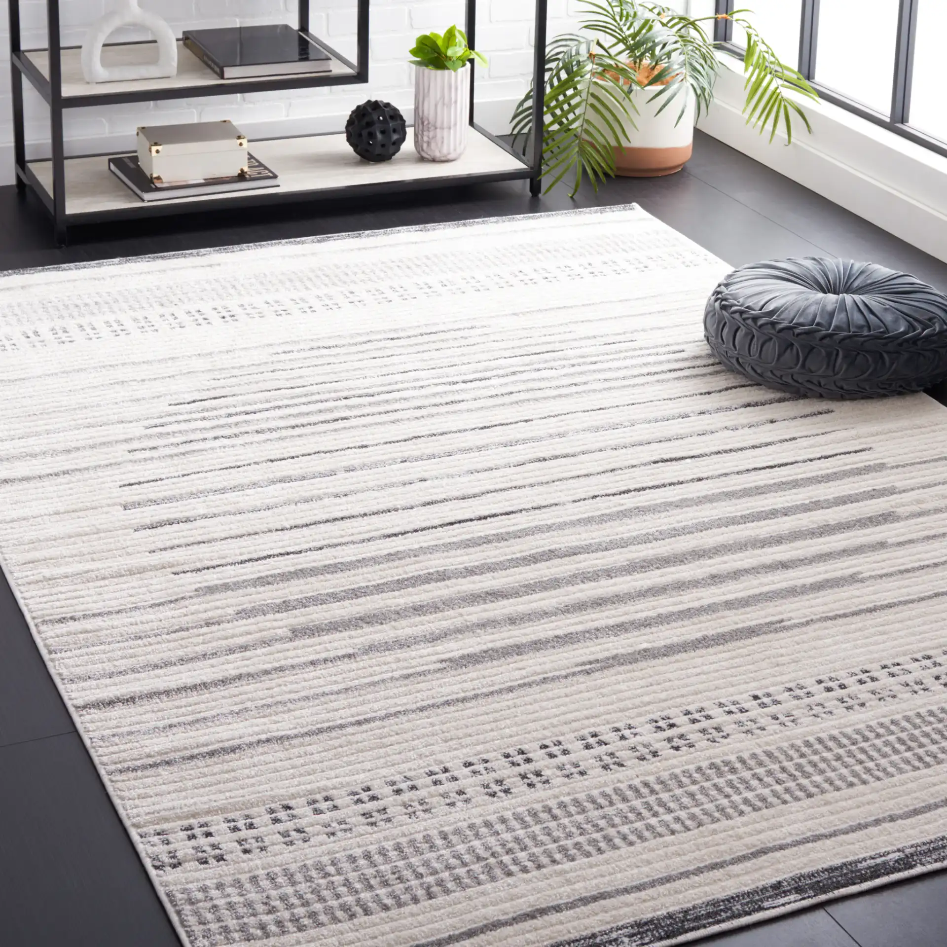 Alamo Linear Sphere Rug in Ivory / Gray in a styled room