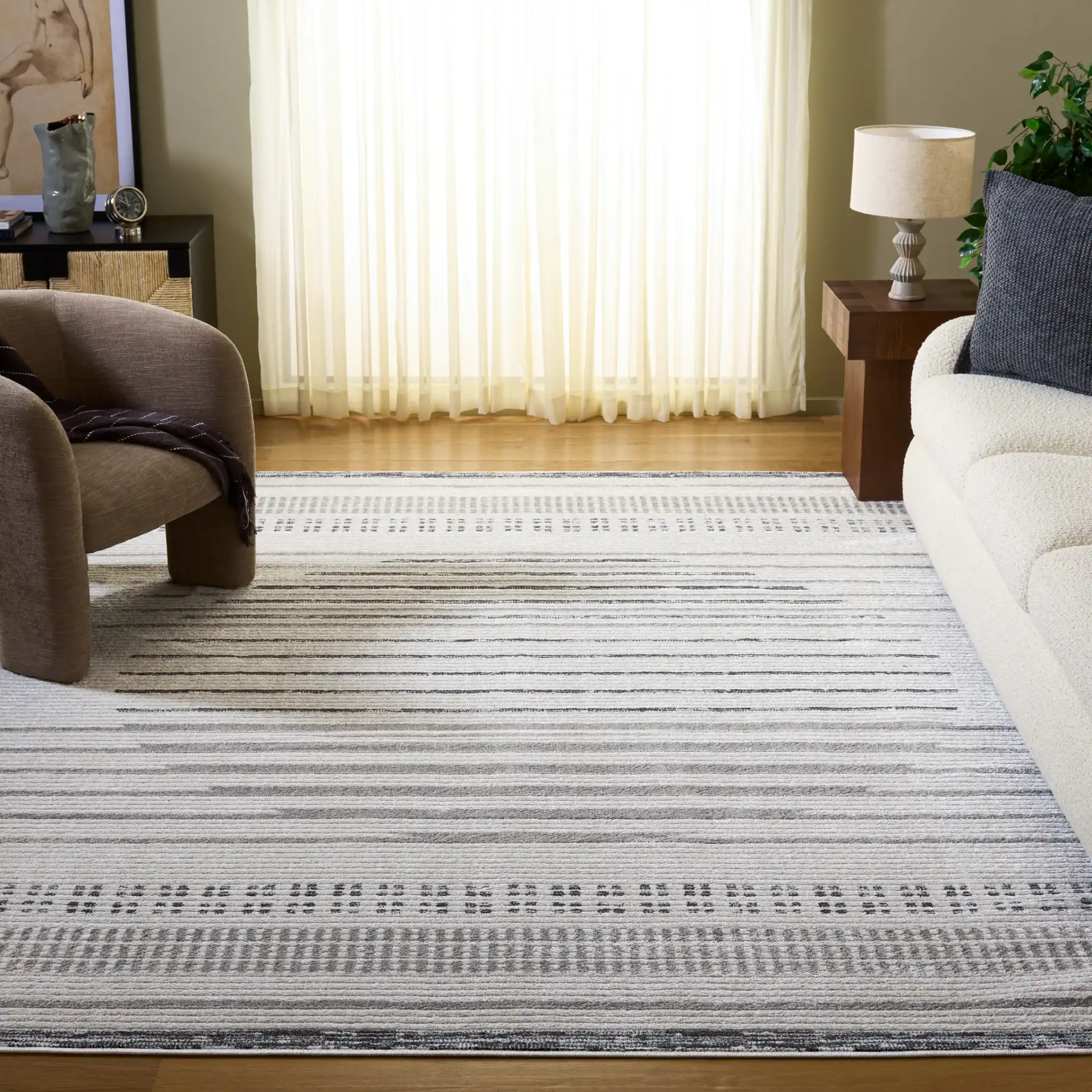 Alamo Linear Sphere Rug in Ivory / Gray in a styled room