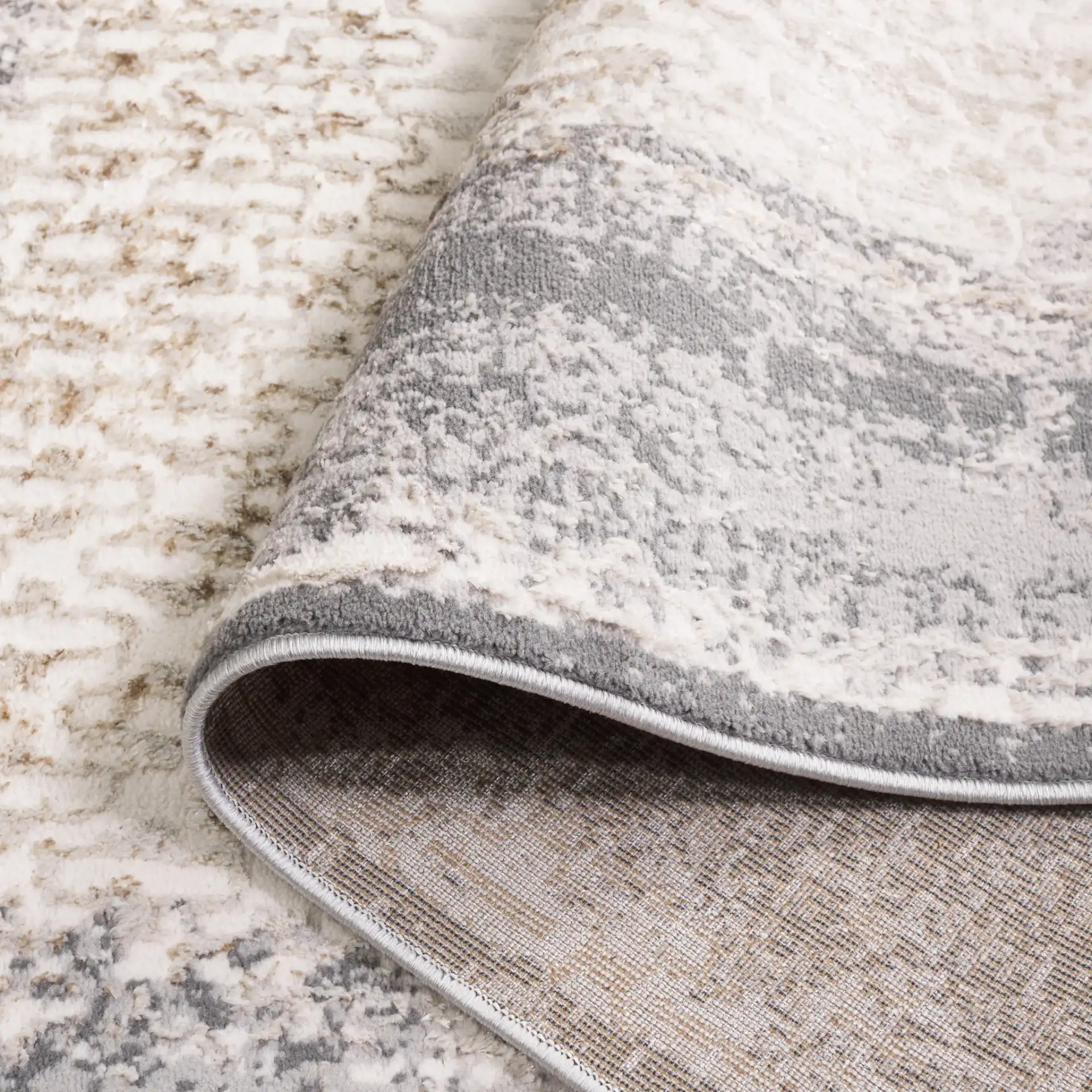 Alenia Distressed Lattice Border Rug in Ivory / Gray in a styled room