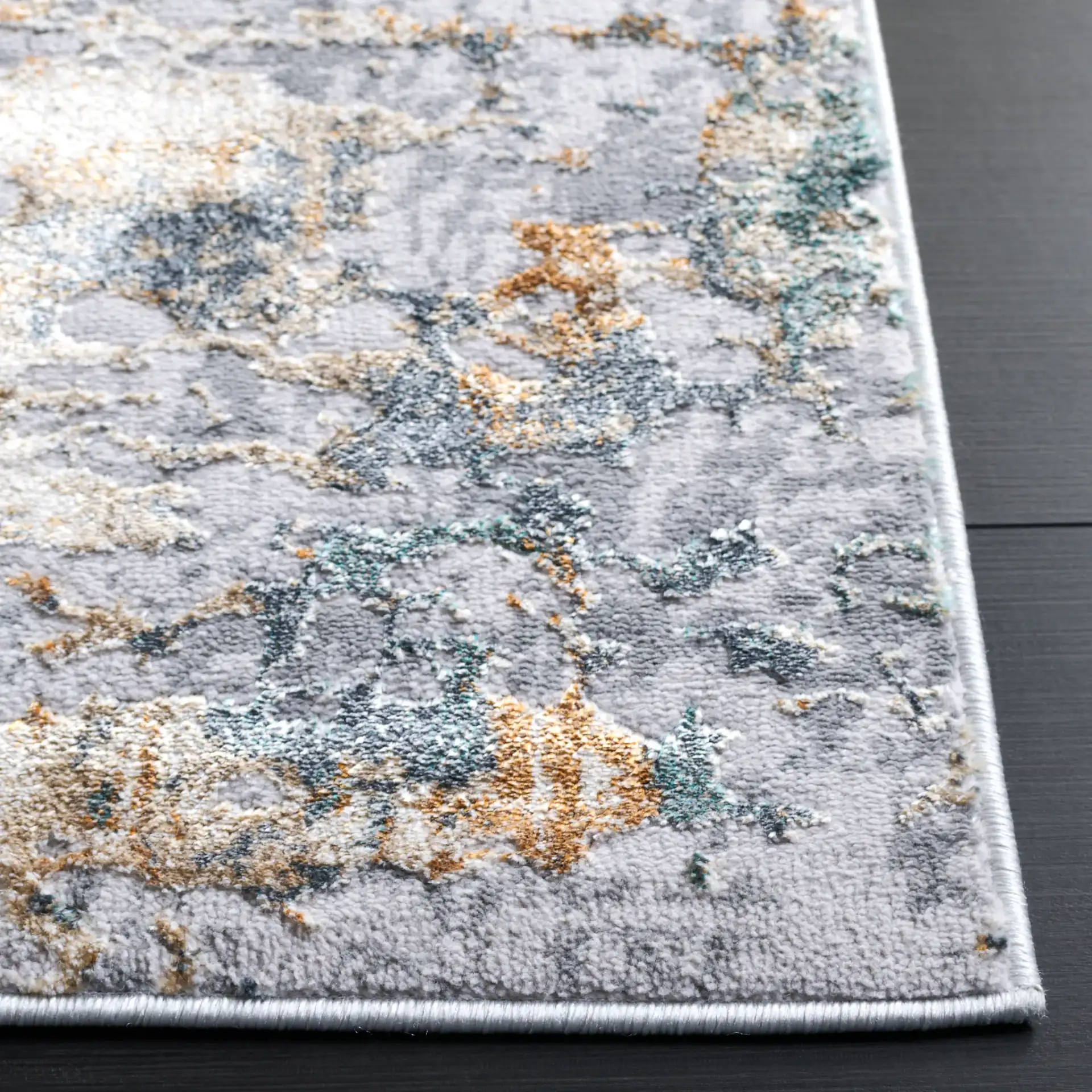 Alenia Mottled Abstract Rug in Gray / Beige in a styled room