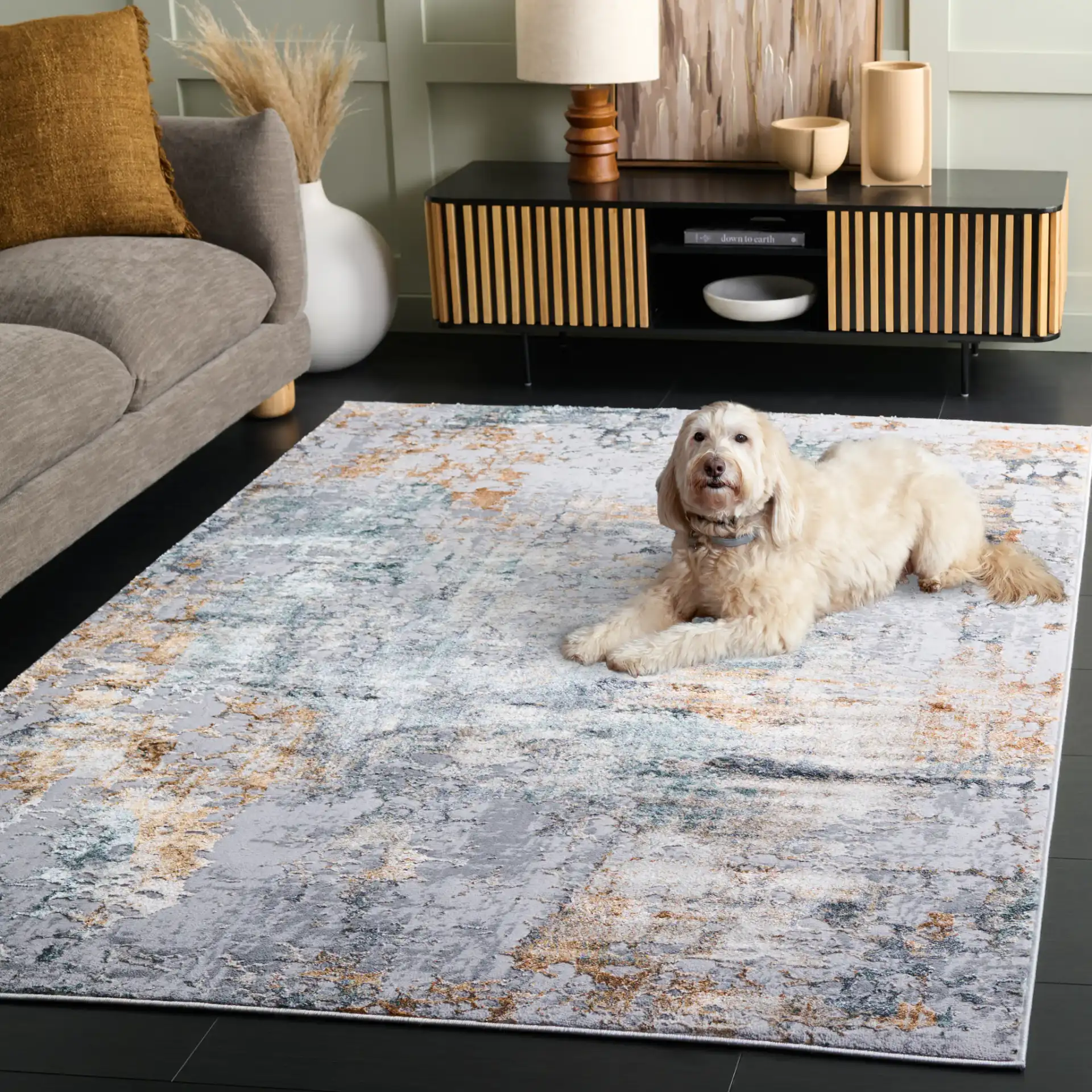 Alenia Mottled Abstract Rug in Gray / Beige in a styled room