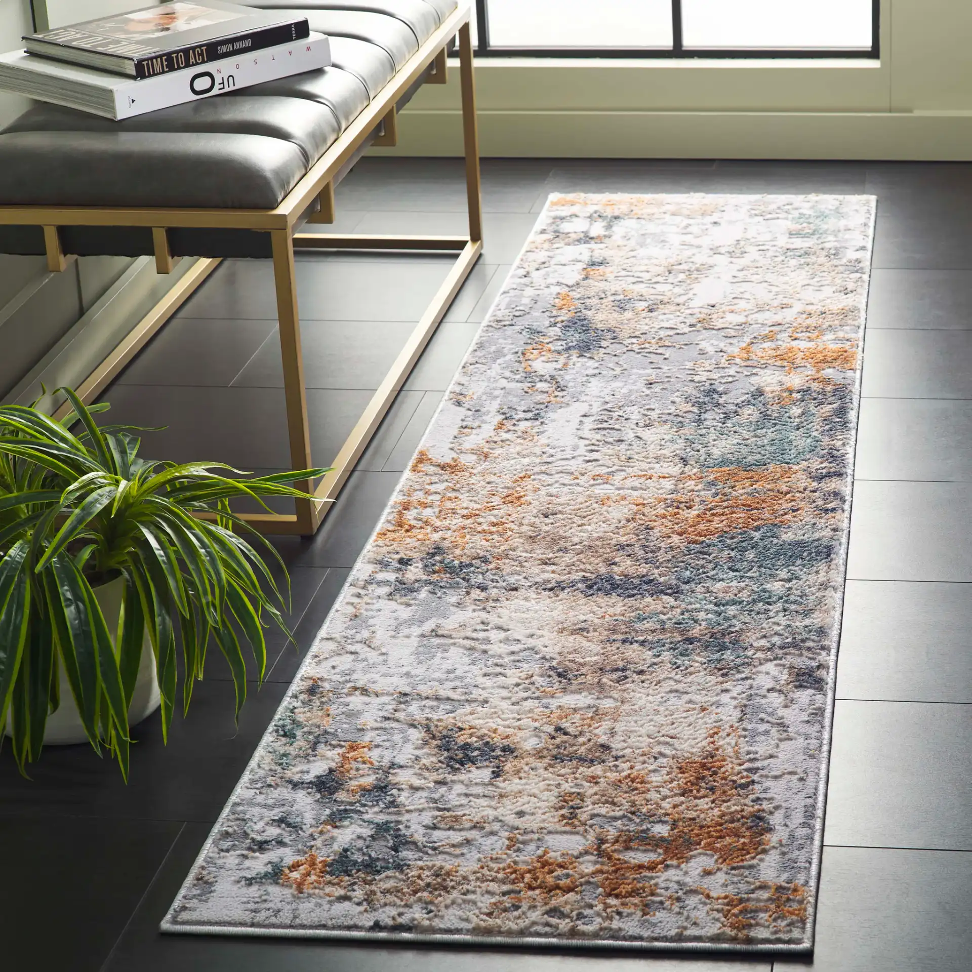Alenia Abstract Brushstroke Rug in Gray / Blue in a styled room