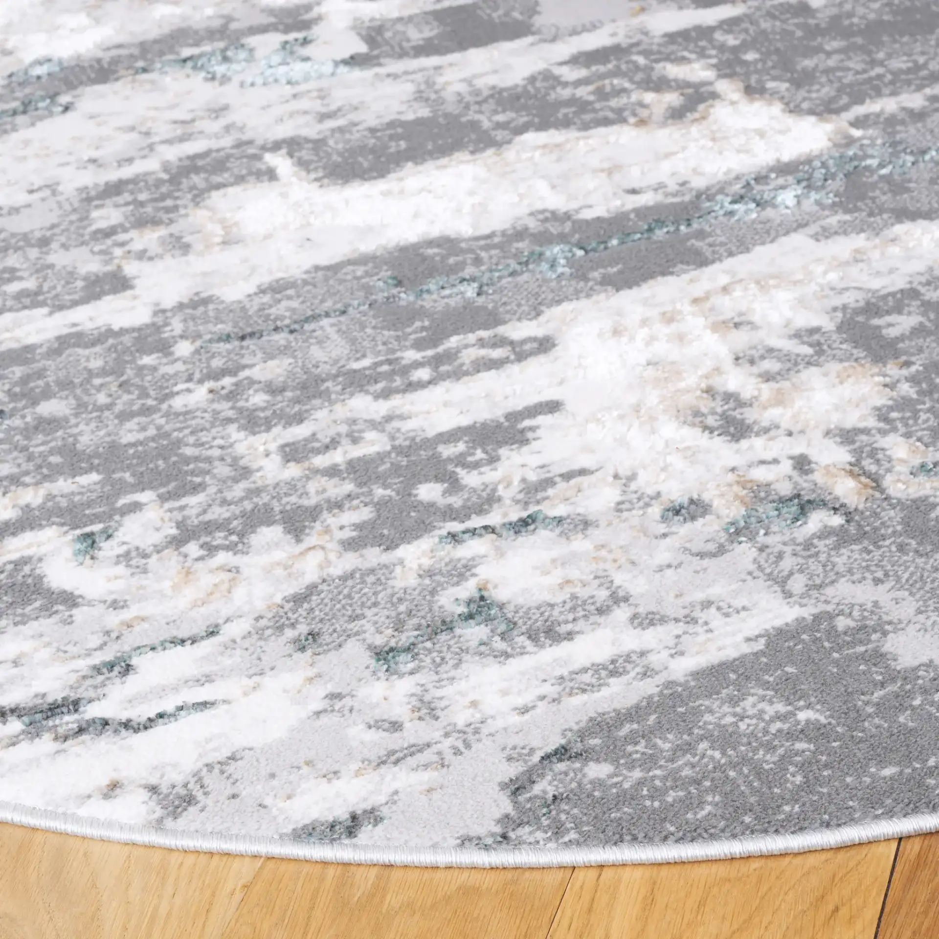 Alenia Abstract Brushstroke Rug in Gray / Blue in a styled room