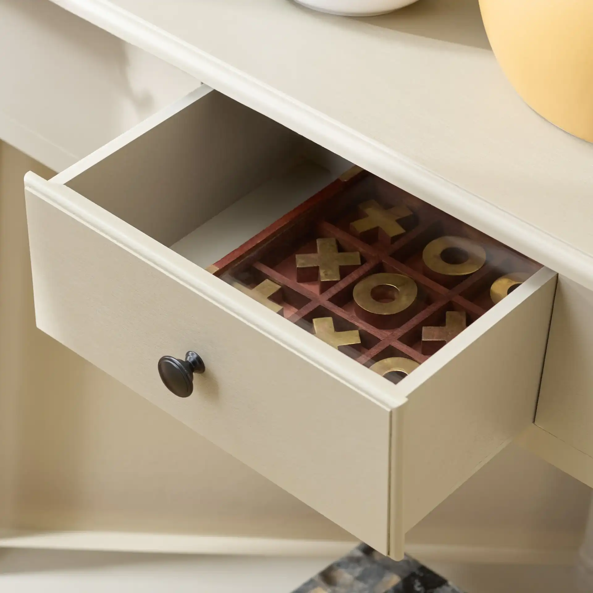 Gomez Corner Table in Vintage Gray in a styled room