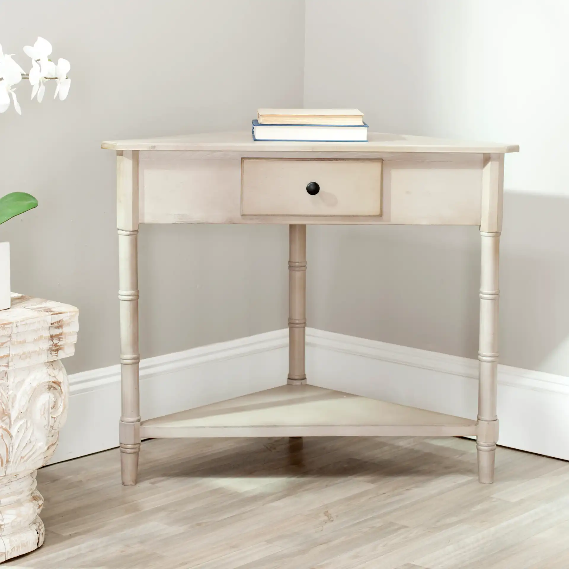 Gomez Corner Table in Vintage Gray in a styled room