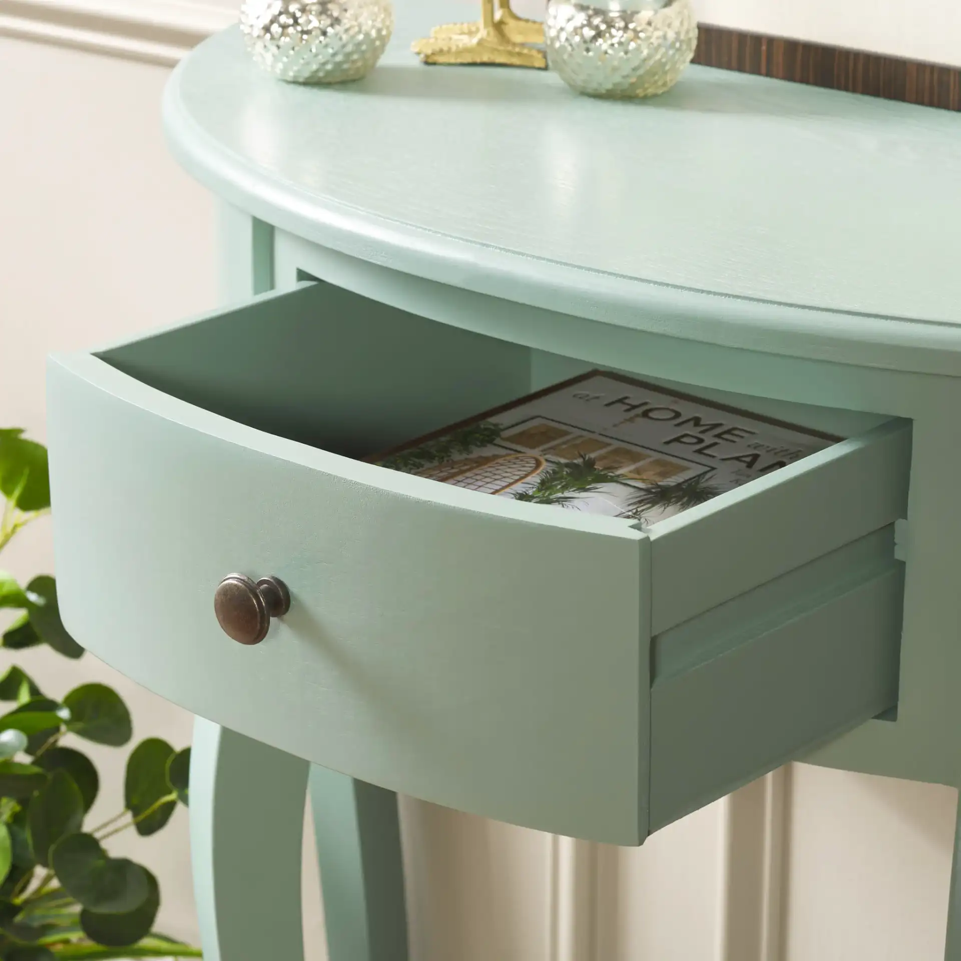 Jan Console in Teal in a styled room