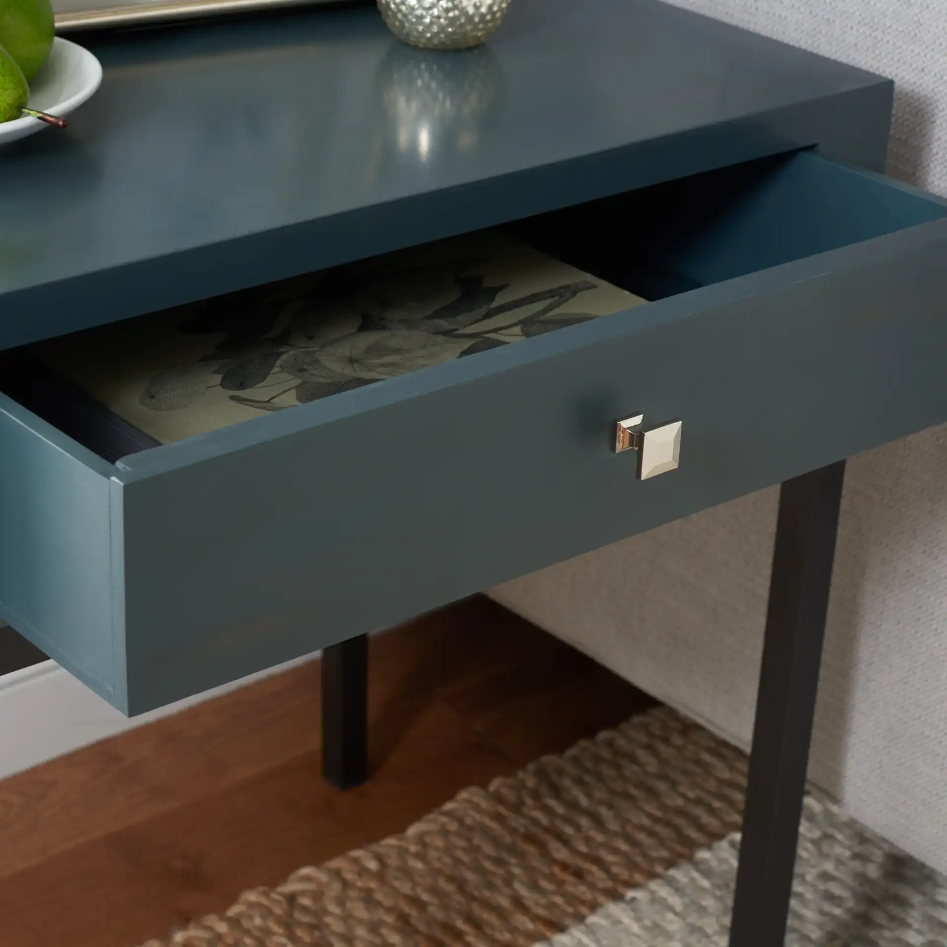 Adena Accent Table in White in a styled room