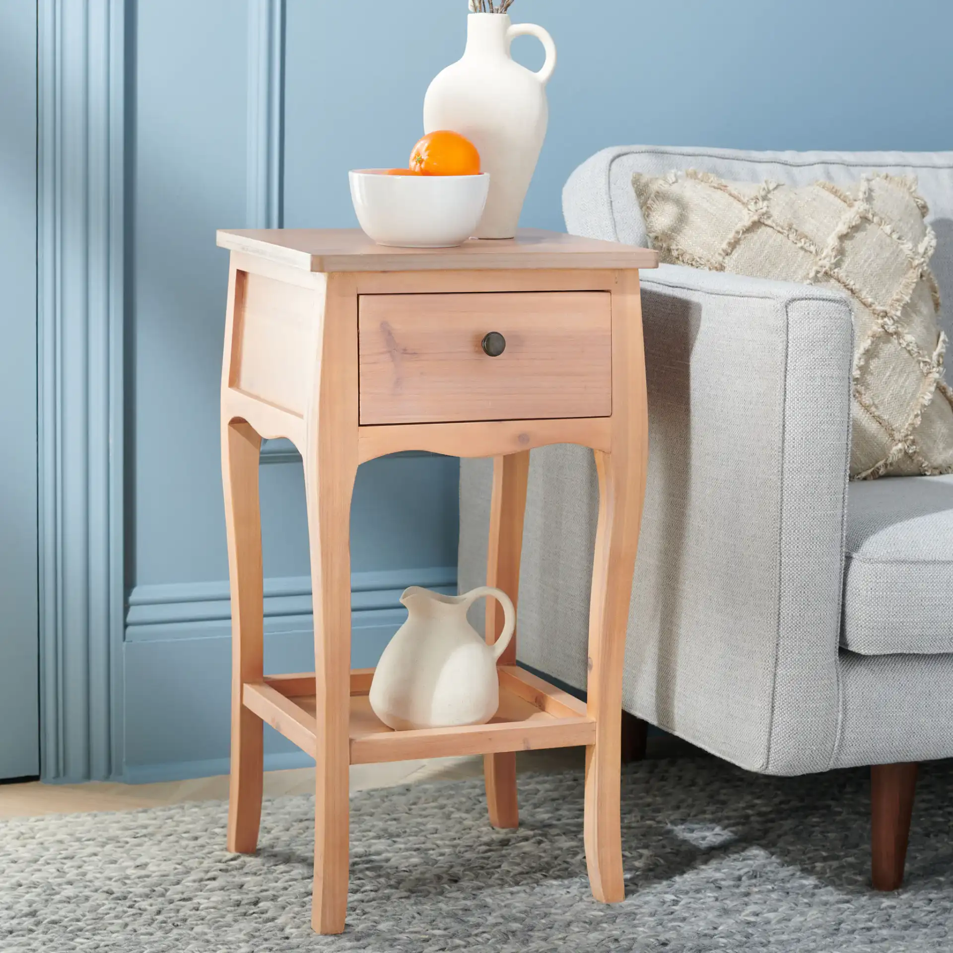 Thelma End Table in Honey Natural in a styled room