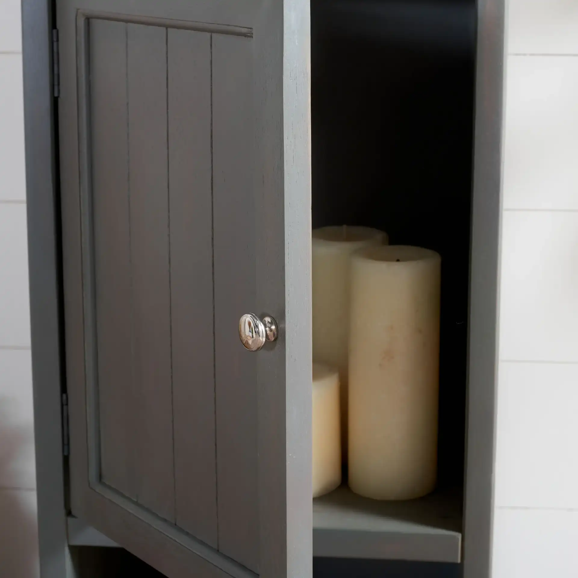 Jezabel End Table in White in a styled room