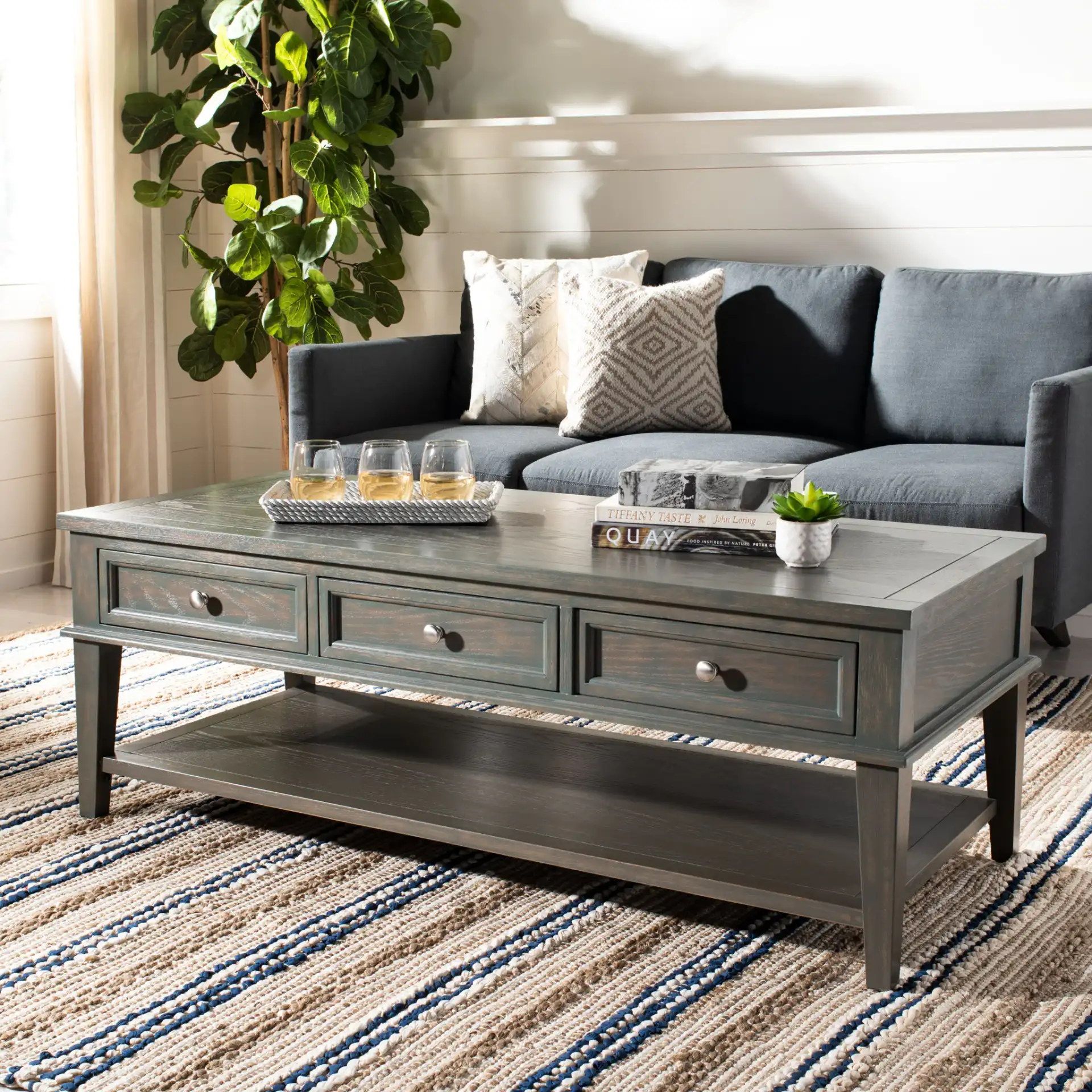 Manelin Coffee Table in Ash Gray in a styled room
