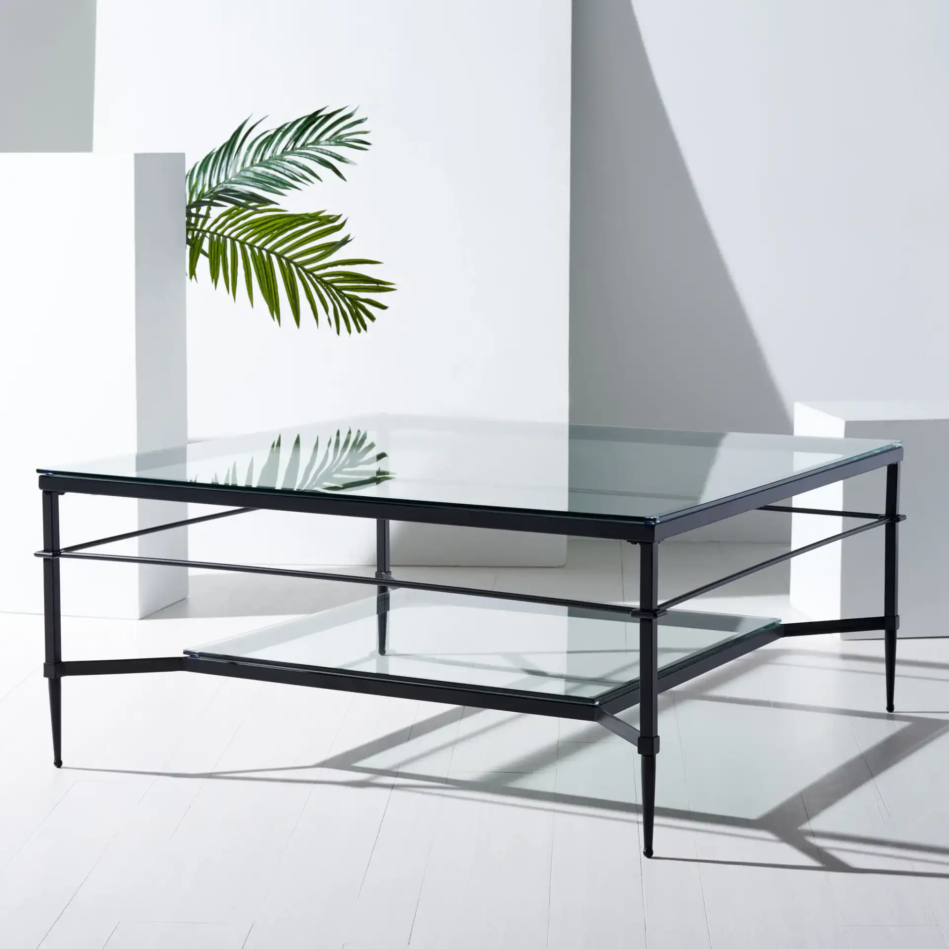 Mieka Cocktail Table in Black in a styled room