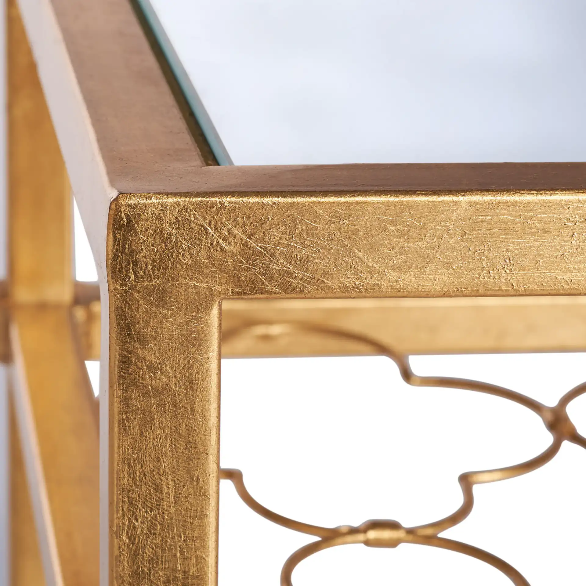 Hanzel Side Table in Gold in a styled room