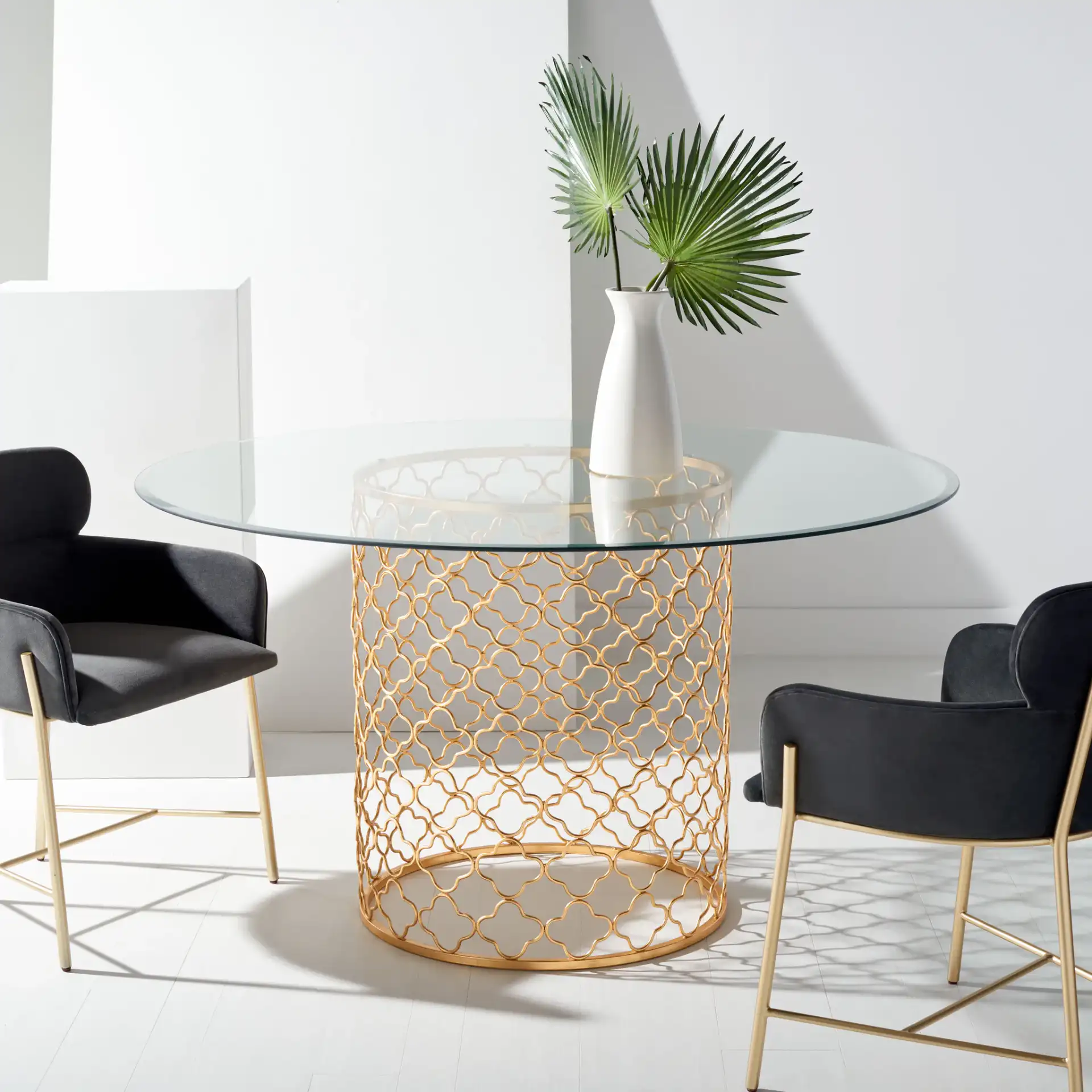 Sandrarose Metal Dining Table in Gold in a styled room