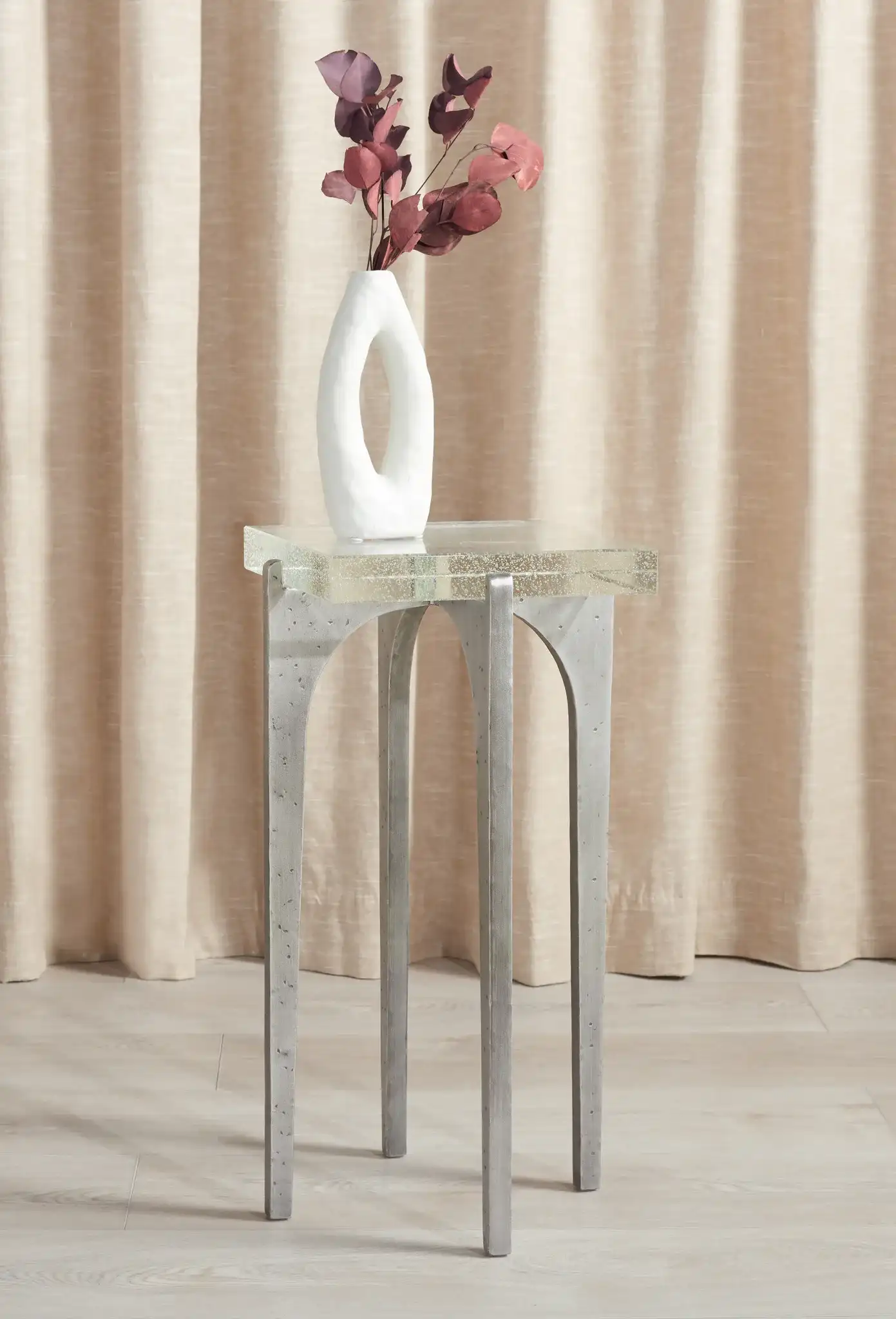 Tawny Square Bubble Glass Accent Table in Silver / Clear in a styled room
