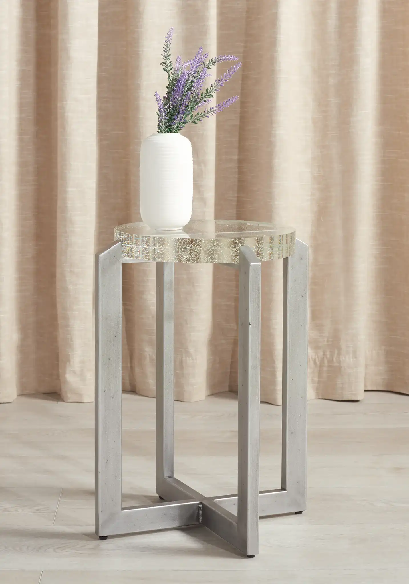 Pixie Round Bubble Glass Accent Table in Silver / Clear in a styled room