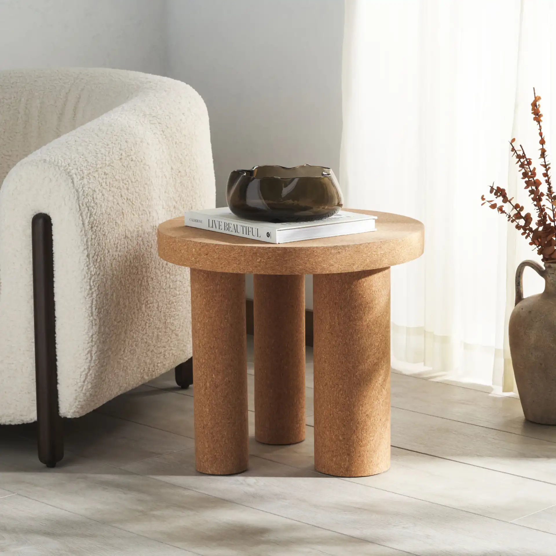Gilligan Cork Three-Leg Accent Table in Cork in a styled room
