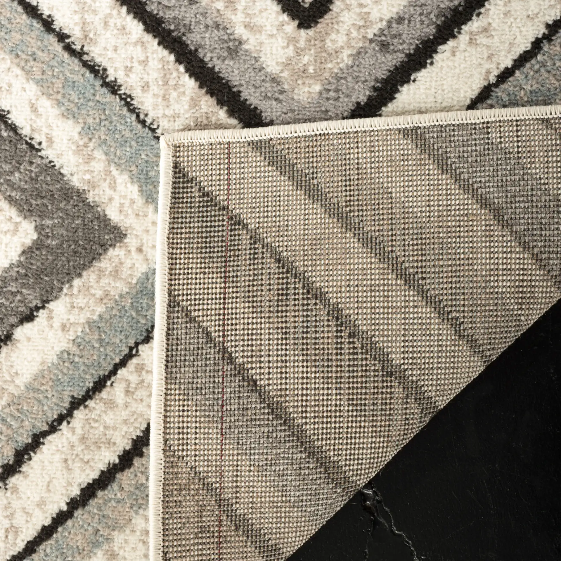 Amsterdam Nested Diamond Rug in Cream / Beige in a styled room