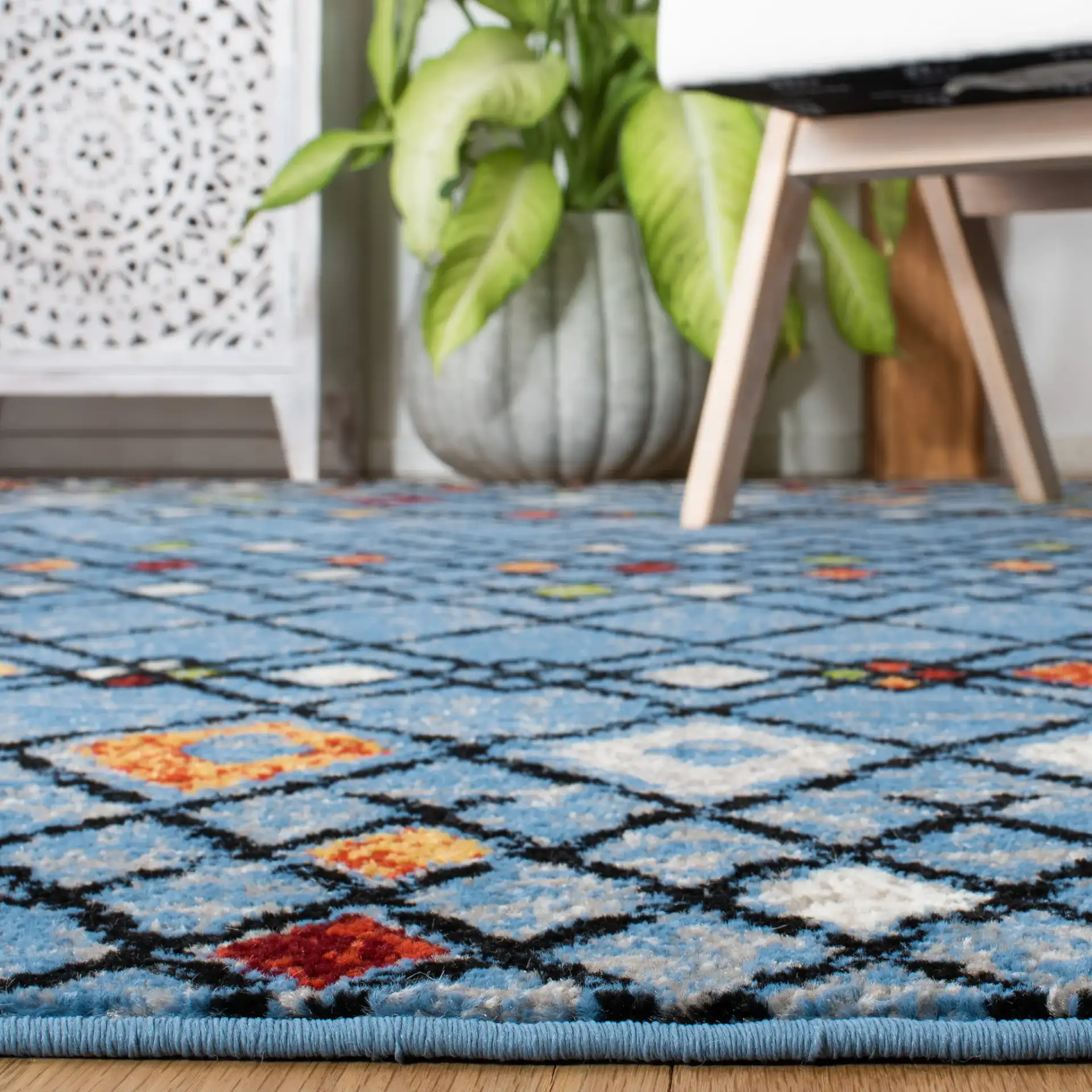 Amsterdam Banded Diamond Rug in Blue / Ivory in a styled room
