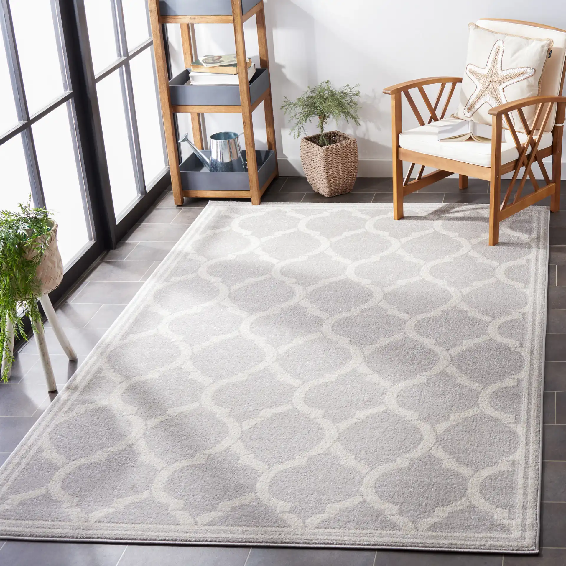 Amherst Trellis Bordered Rug in Light Gray / Ivory in a styled room