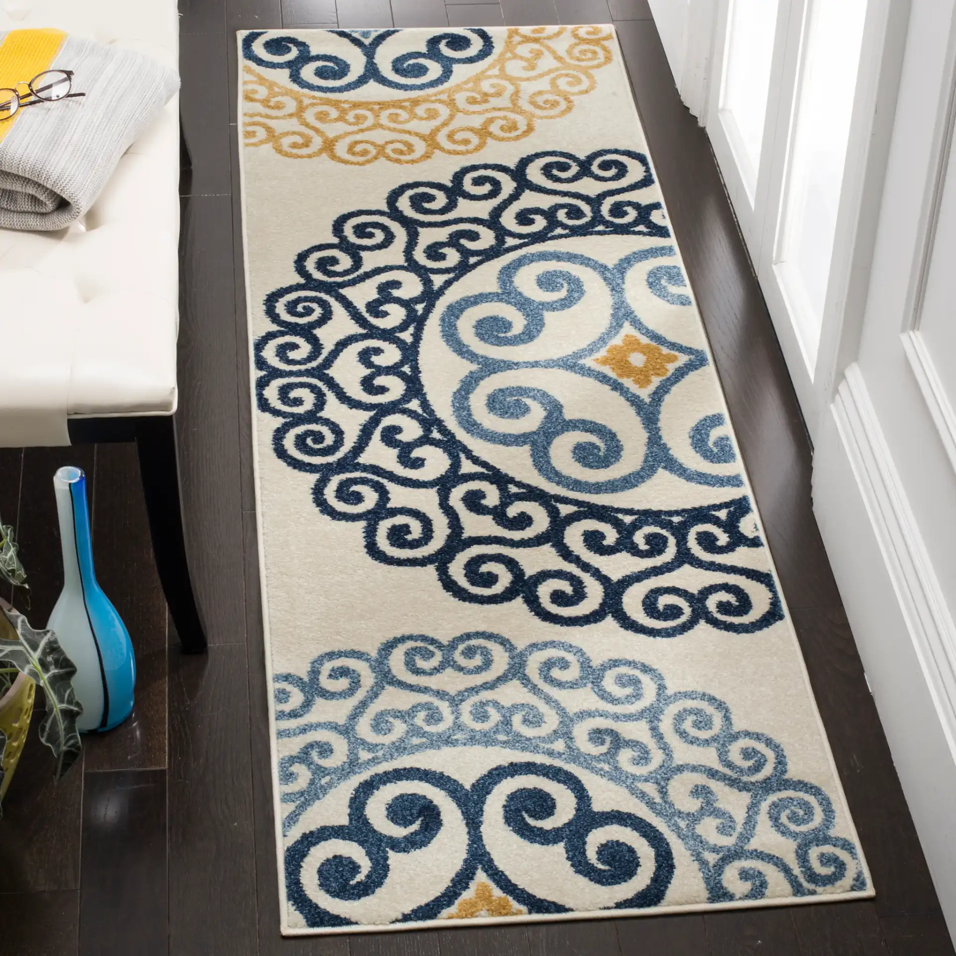 Amherst Scroll Medallion Rug in Ivory / Gold in a styled room