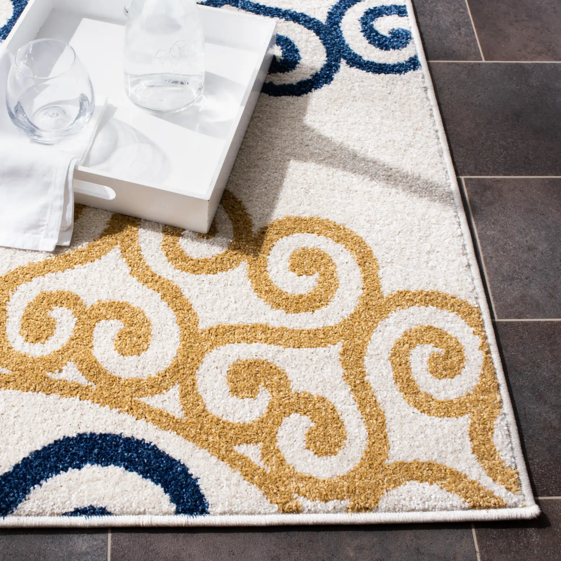 Amherst Scroll Medallion Rug in Ivory / Gold in a styled room