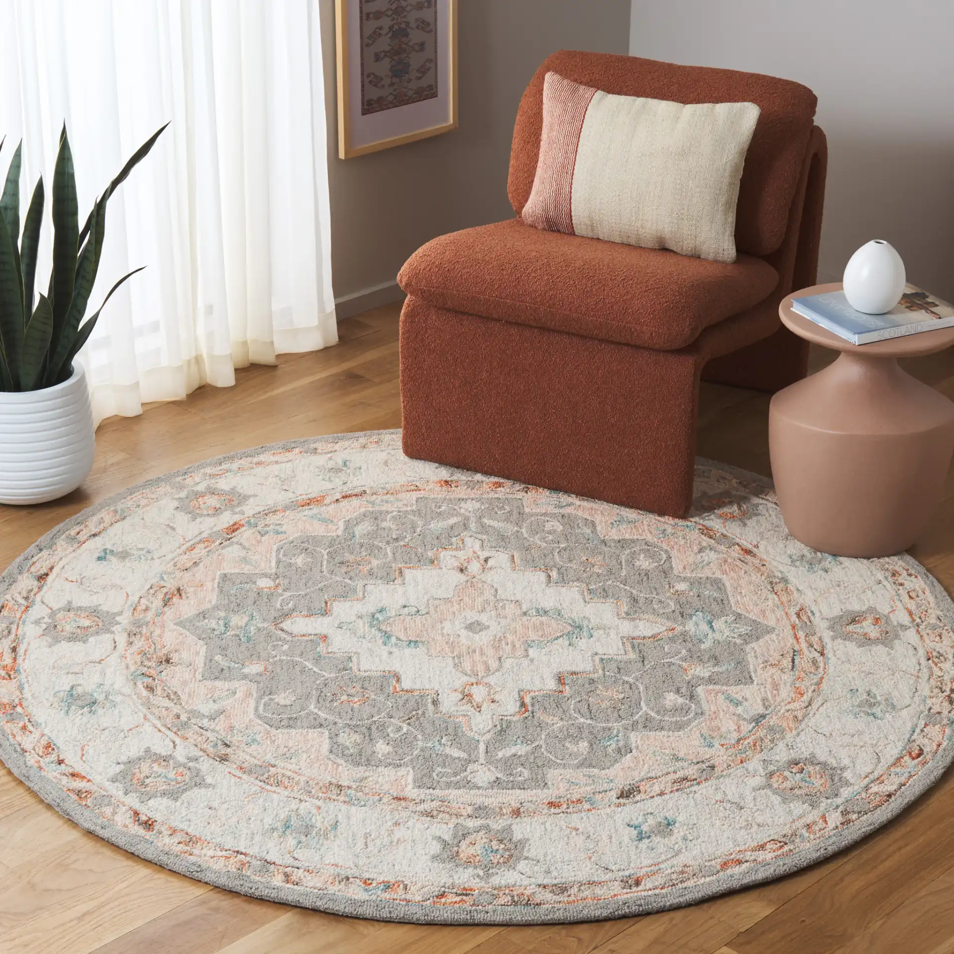 Anatolia Stepped Medallion Hand-Tufted Wool Rug in Gray / Rust in a styled room
