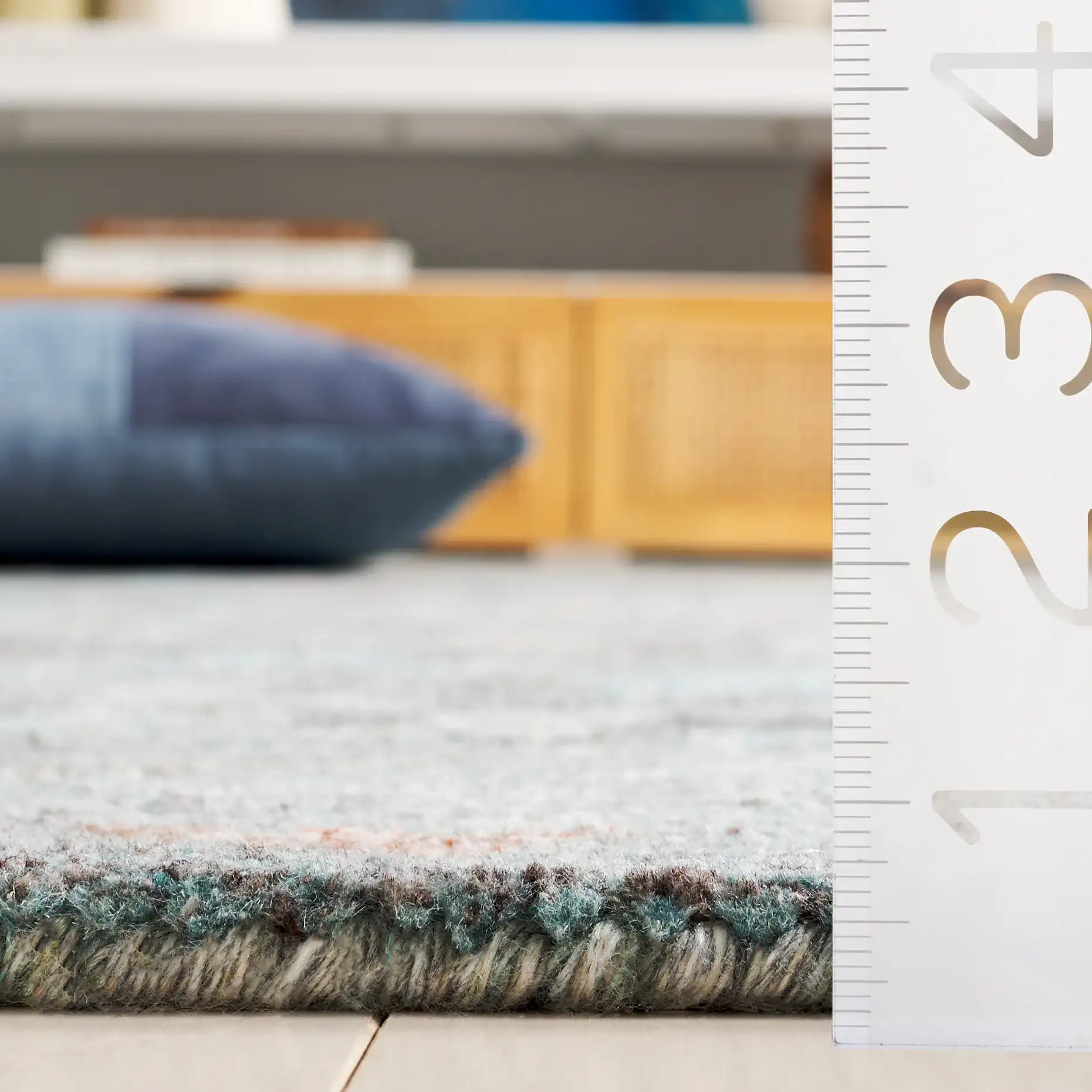 Anatolia Stepped Medallion Hand-Tufted Rug in Teal / Brown in a styled room