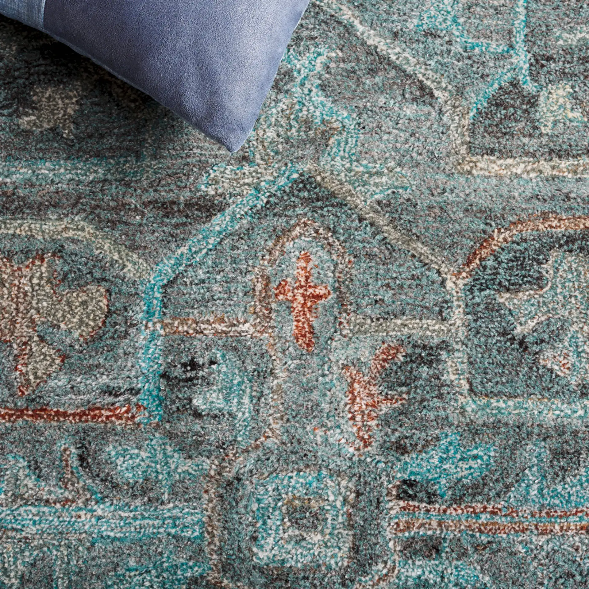 Anatolia Stepped Medallion Hand-Tufted Rug in Teal / Brown in a styled room