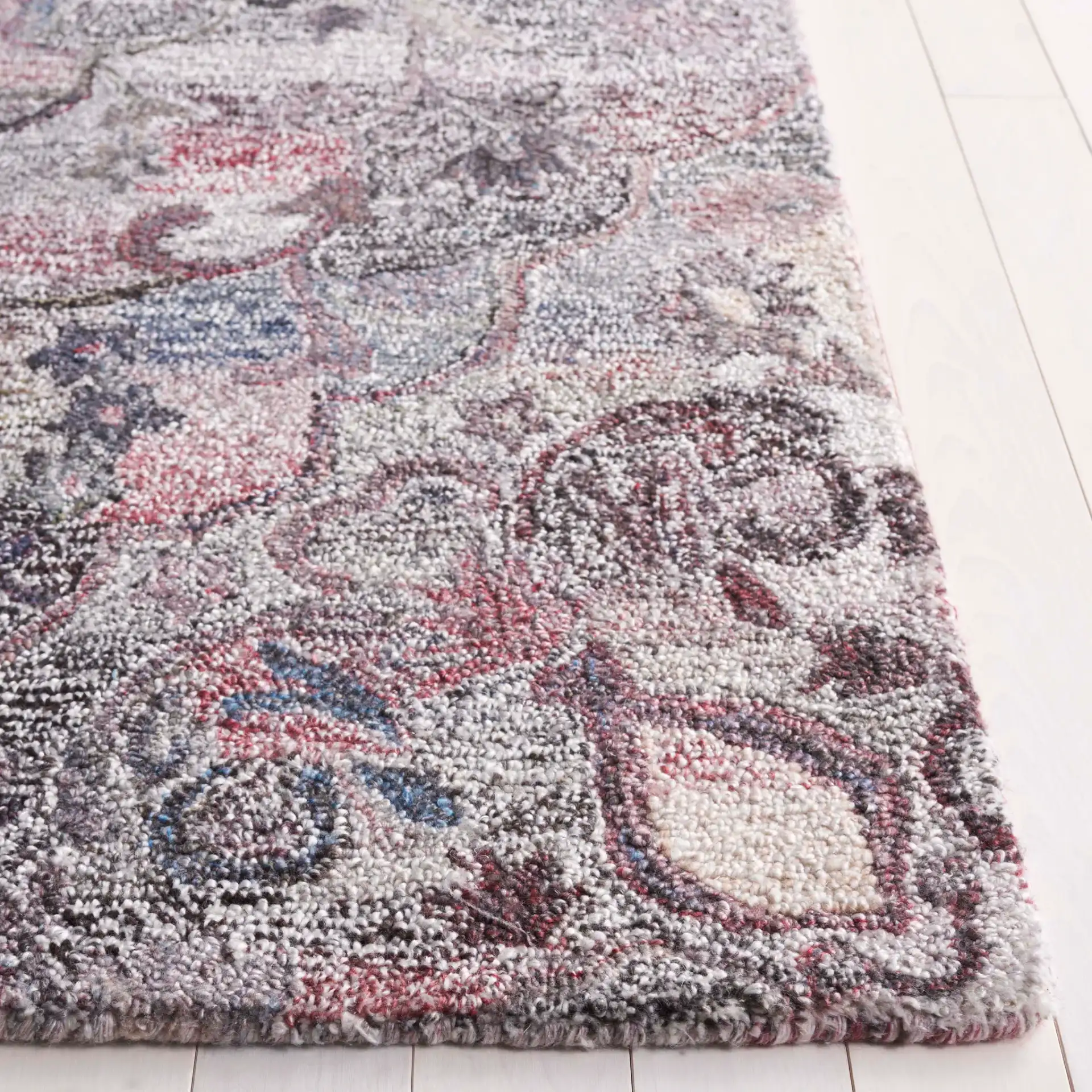 Anatolia Faded Medallion Hand-Tufted Rug in Brown / Pink in a styled room