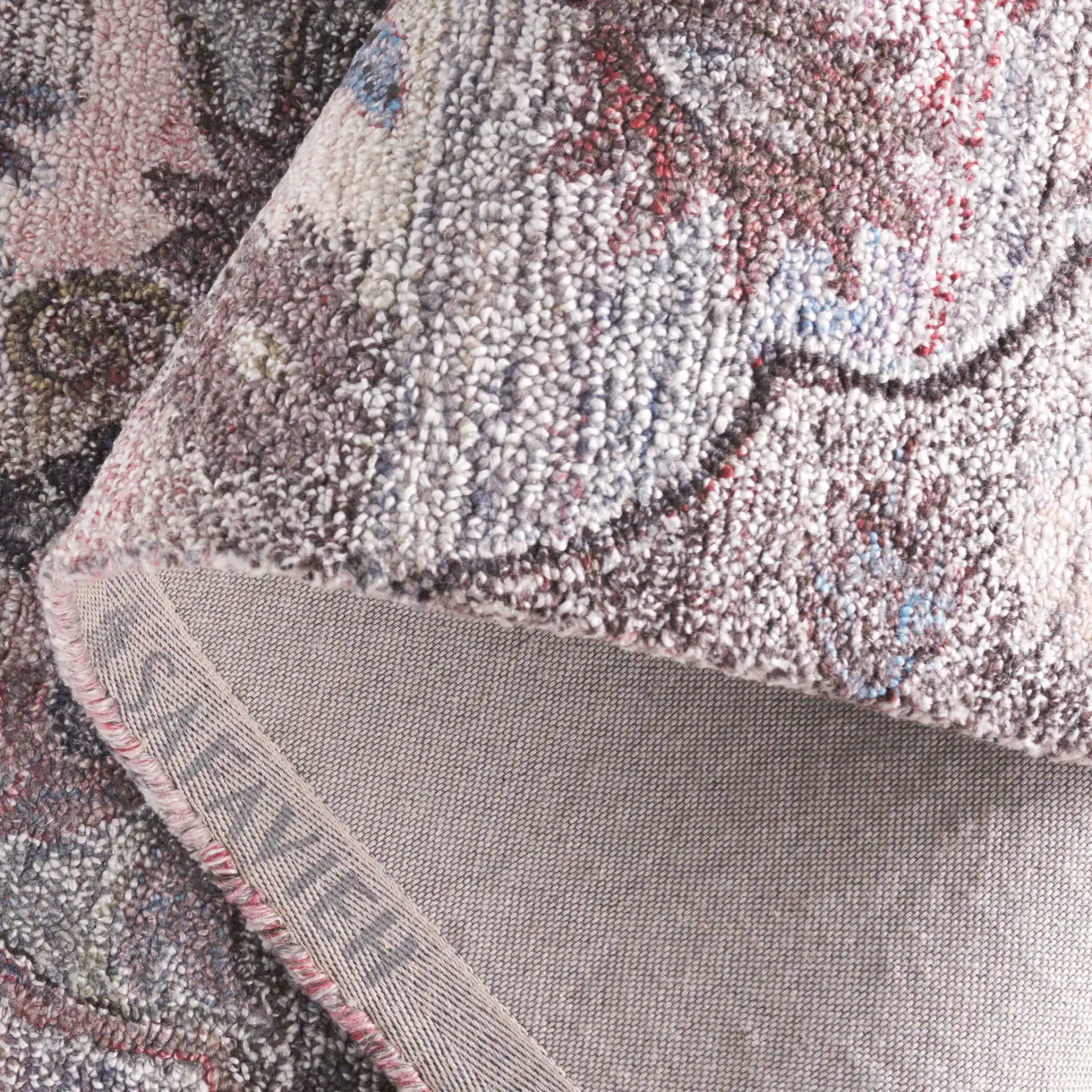 Anatolia Faded Medallion Hand-Tufted Rug in Brown / Pink in a styled room