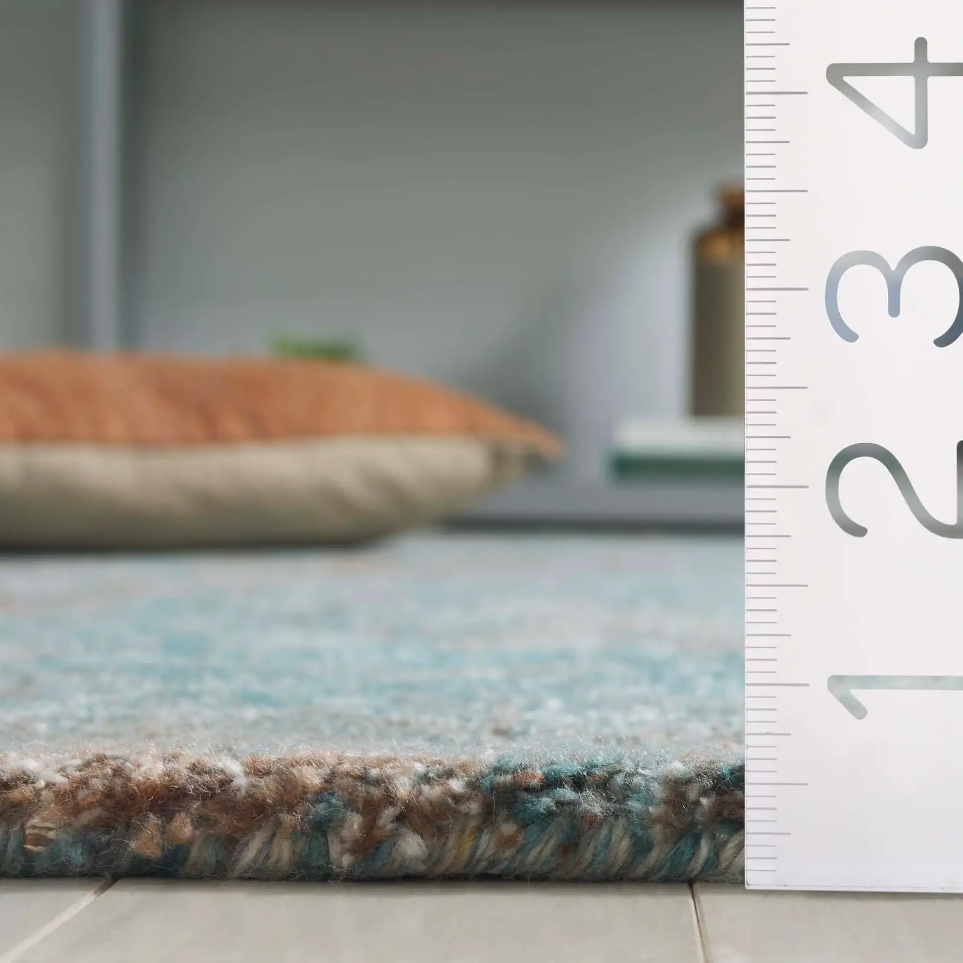 Anatolia Floral Medallion Hand-Tufted Rug in Turquoise / Brown in a styled room