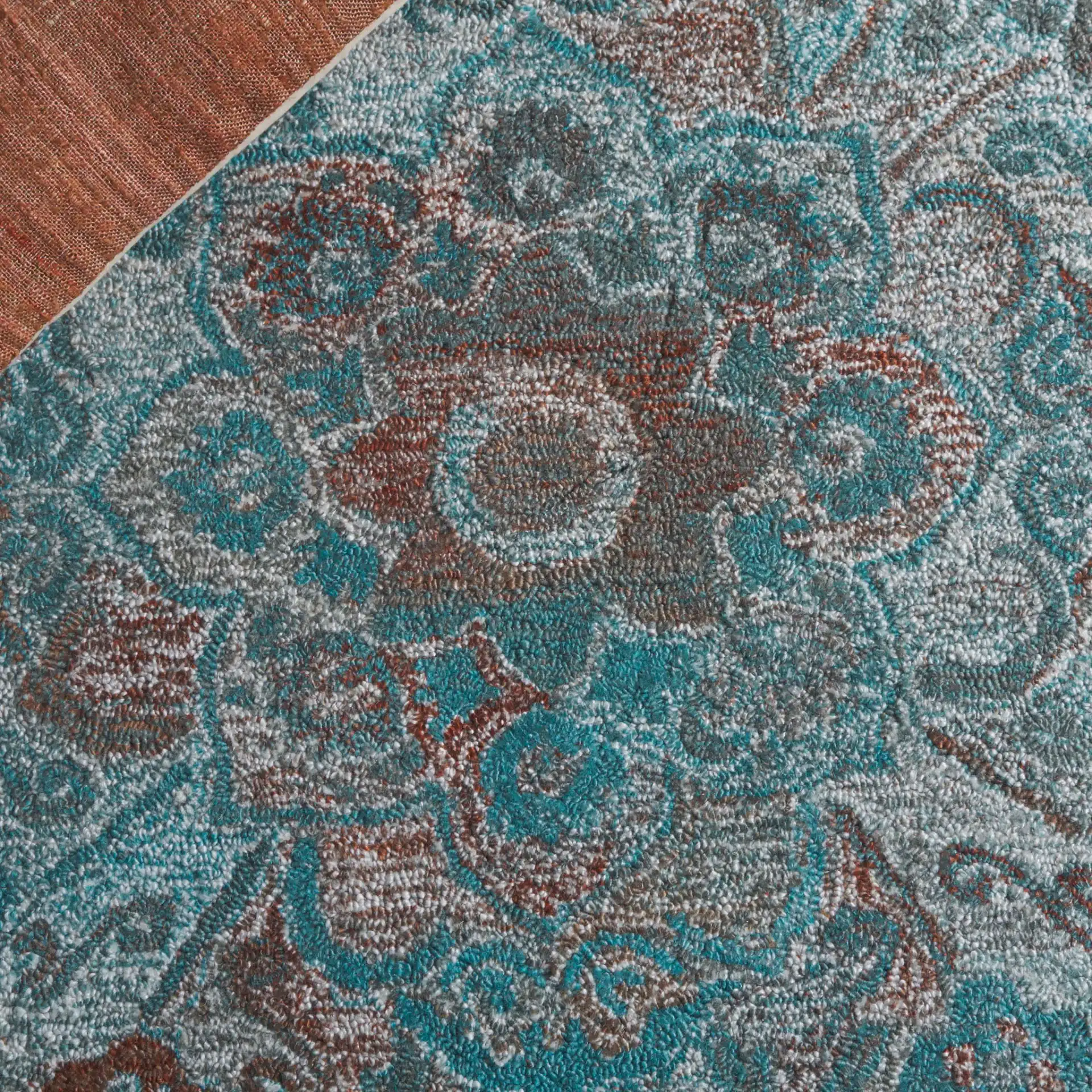 Anatolia Floral Medallion Hand-Tufted Rug in Turquoise / Brown in a styled room