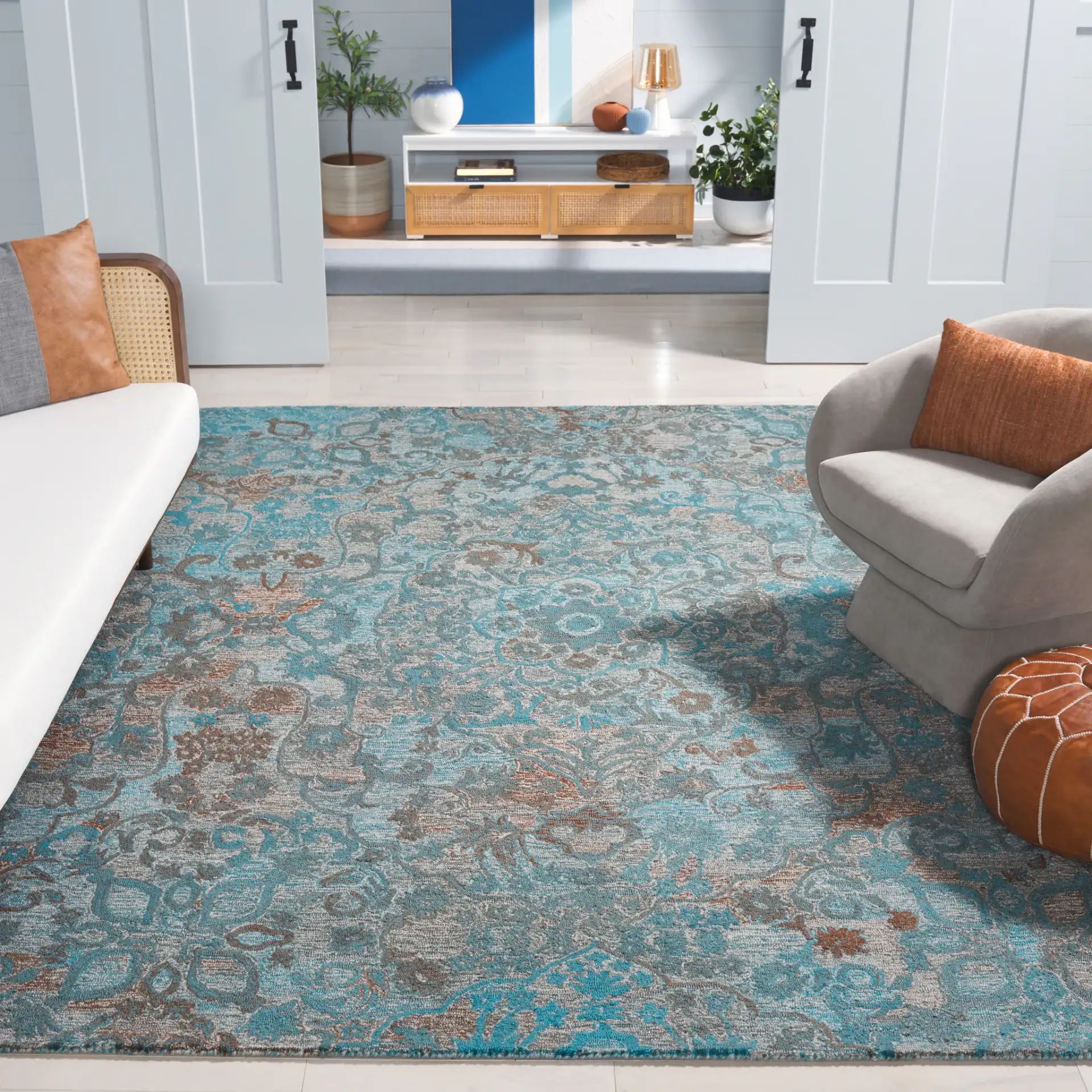 Anatolia Floral Medallion Hand-Tufted Rug in Turquoise / Brown in a styled room