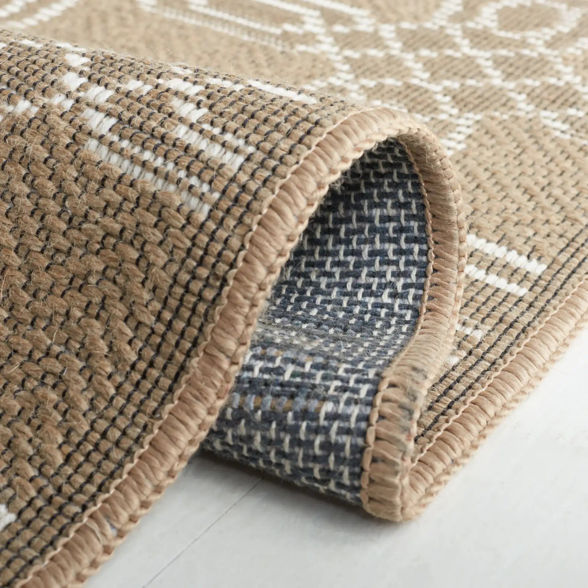 Aspect Interlocking Lattice Jute Rug in Natural / Ivory in a styled room