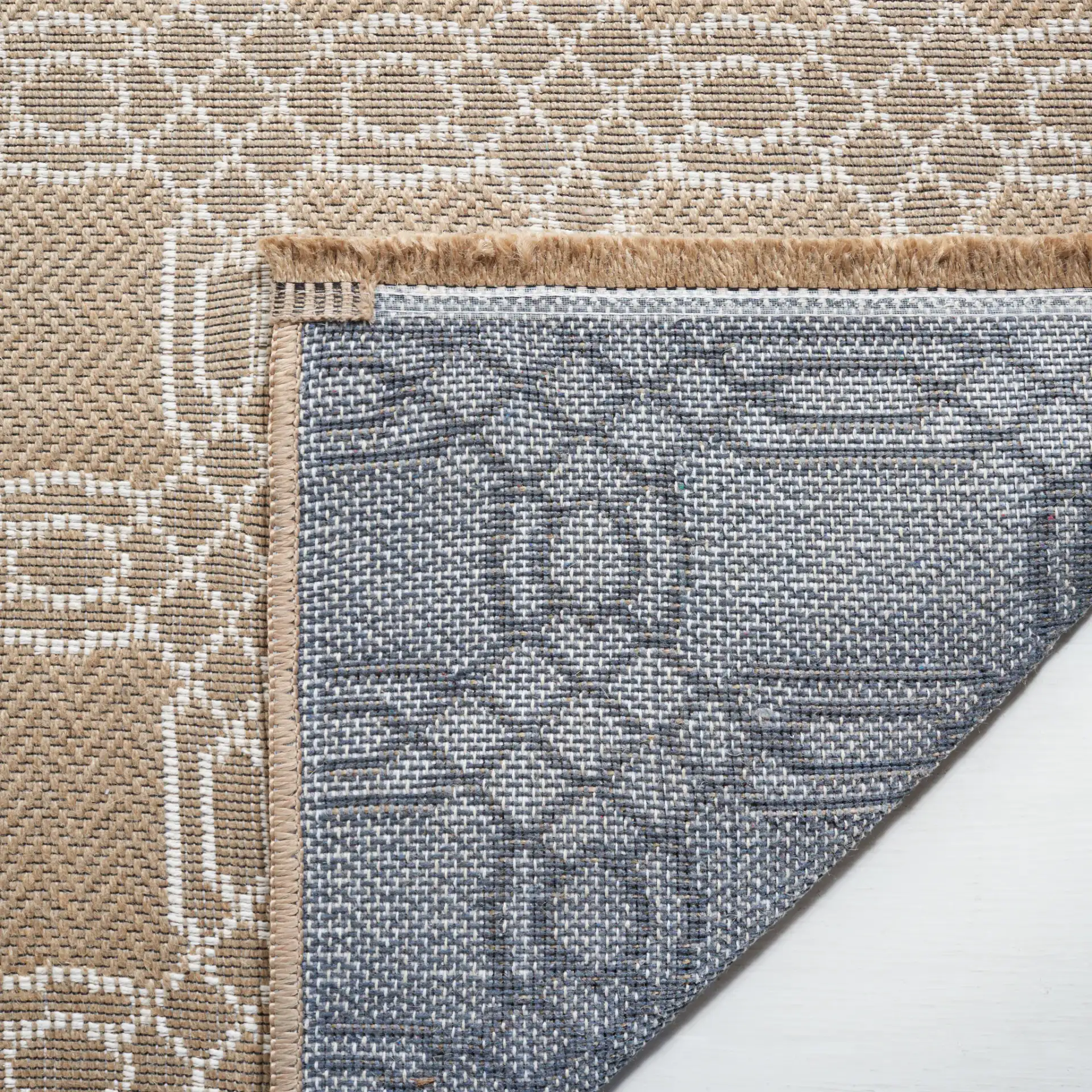 Aspect Interlocking Lattice Jute Rug in Natural / Ivory in a styled room