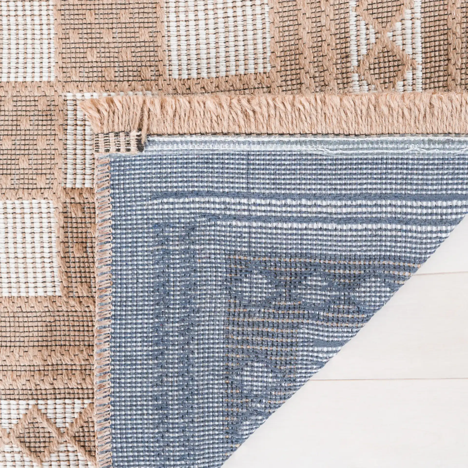 Aspect Bordered Checkerboard Jute Rug in Natural / Ivory in a styled room