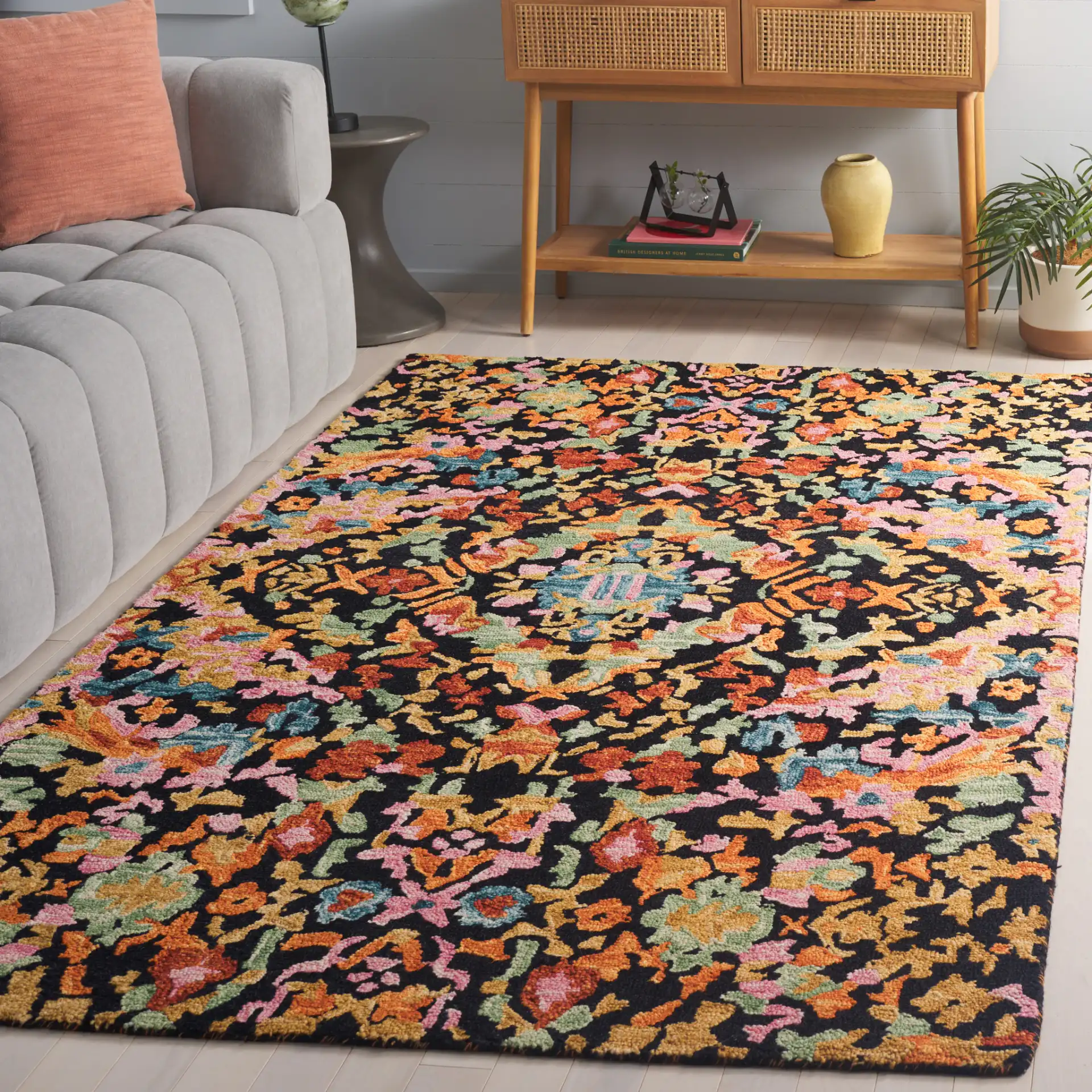 Aspen Mosaic Medallion Hand-Tufted Wool Rug in Black / Rust in a styled room