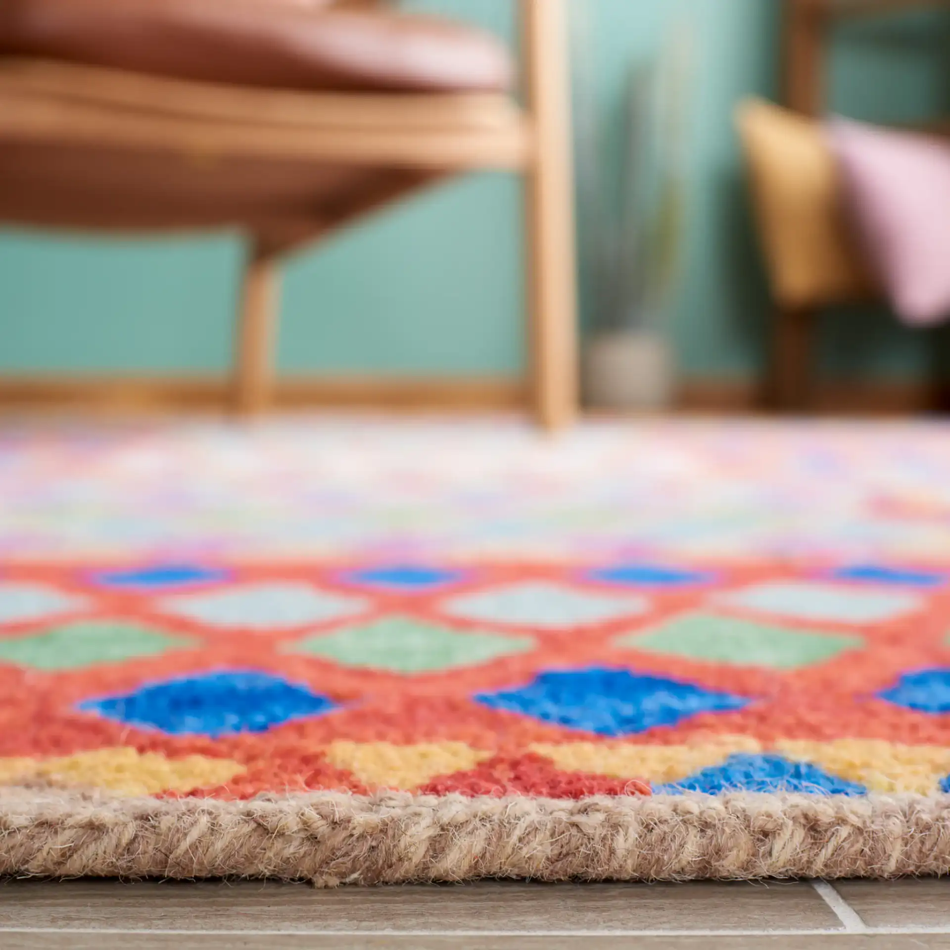 Aspen Patchwork Diamond Hand-Tufted Wool Rug in Red / Blue in a styled room