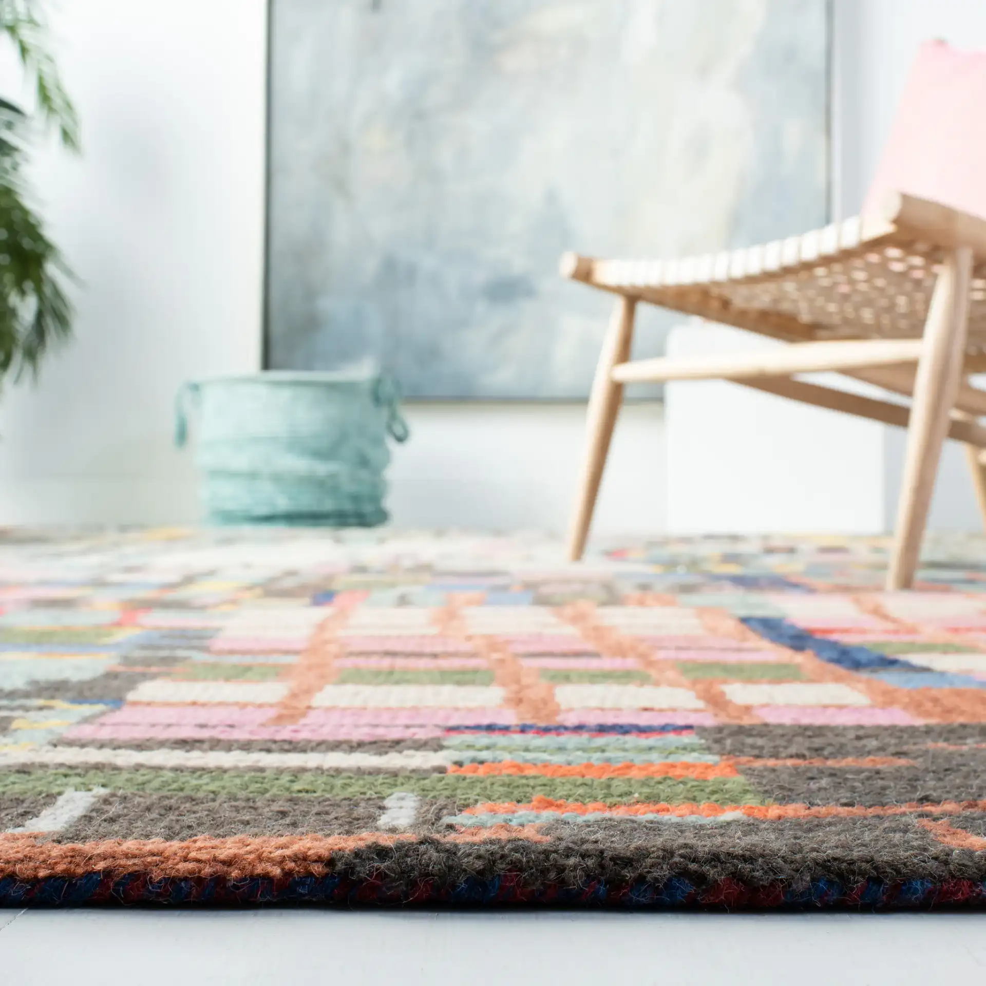 Aspen Patchwork Grid Hand-Tufted Wool Rug in Ivory / Black in a styled room