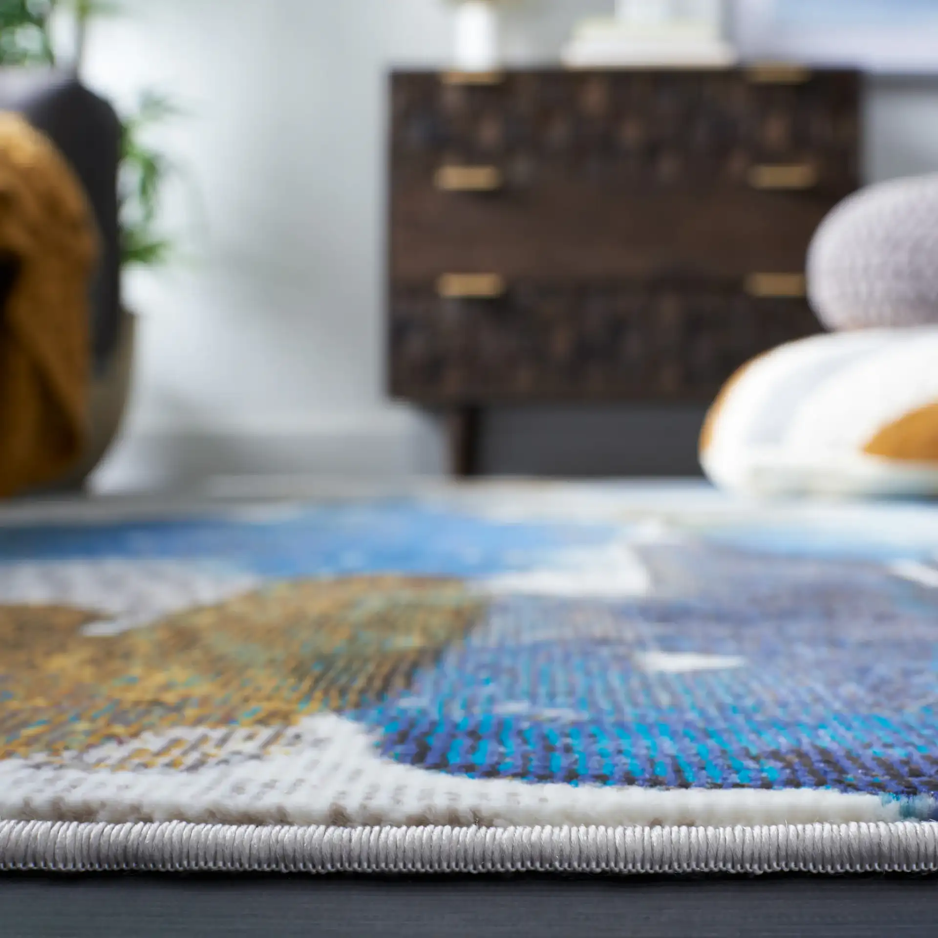 Aria Abstract Painterly Rug in Ivory / Navy in a styled room
